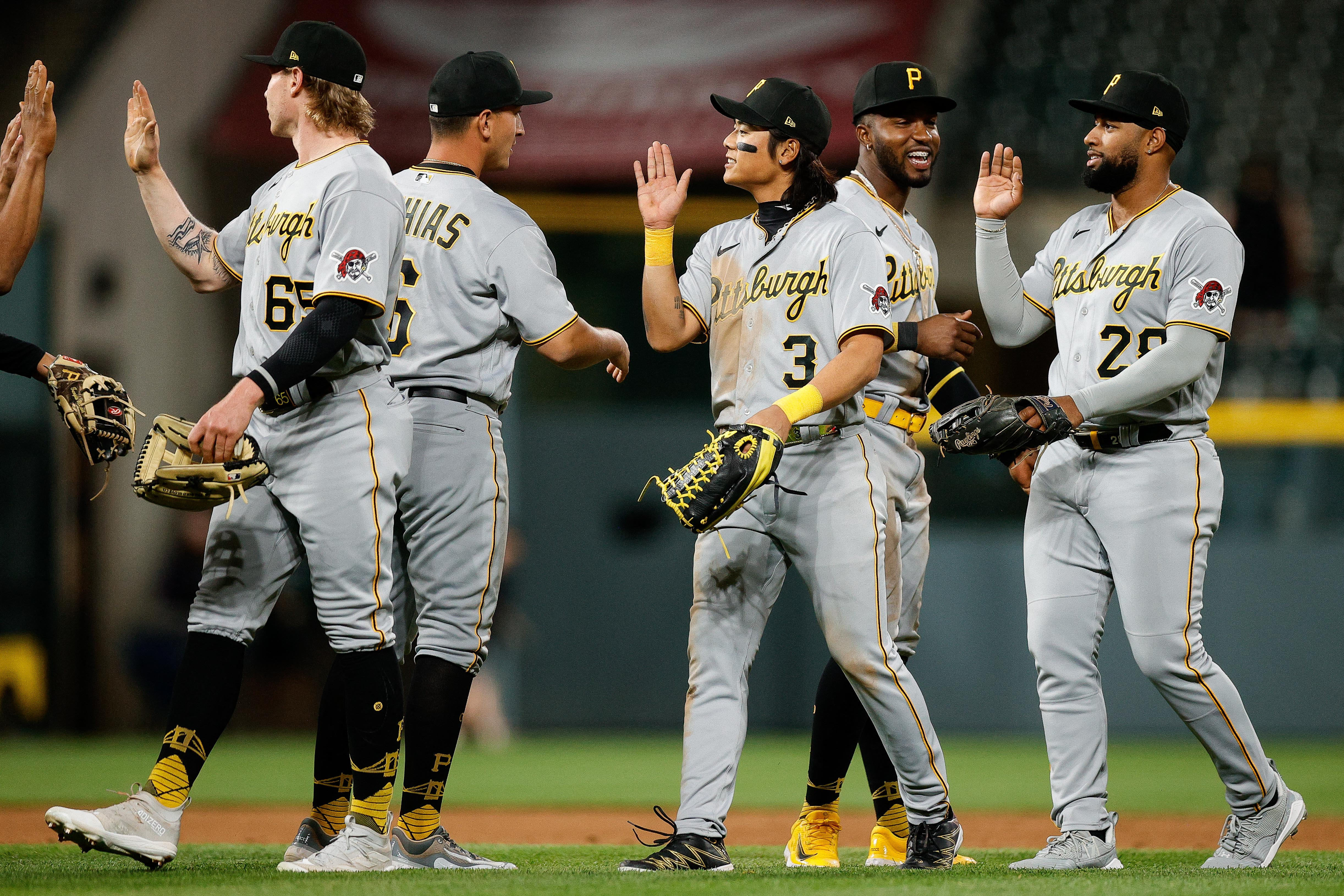 Pirates jump on Rockies early, cruise to 14-3 rout