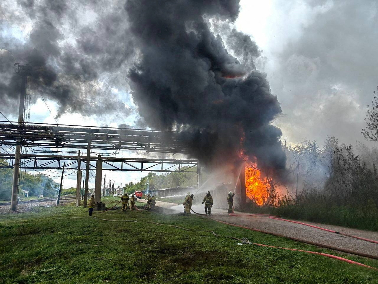 Firefighters extinguish a fire at the Sterlitamak petrochemical plant