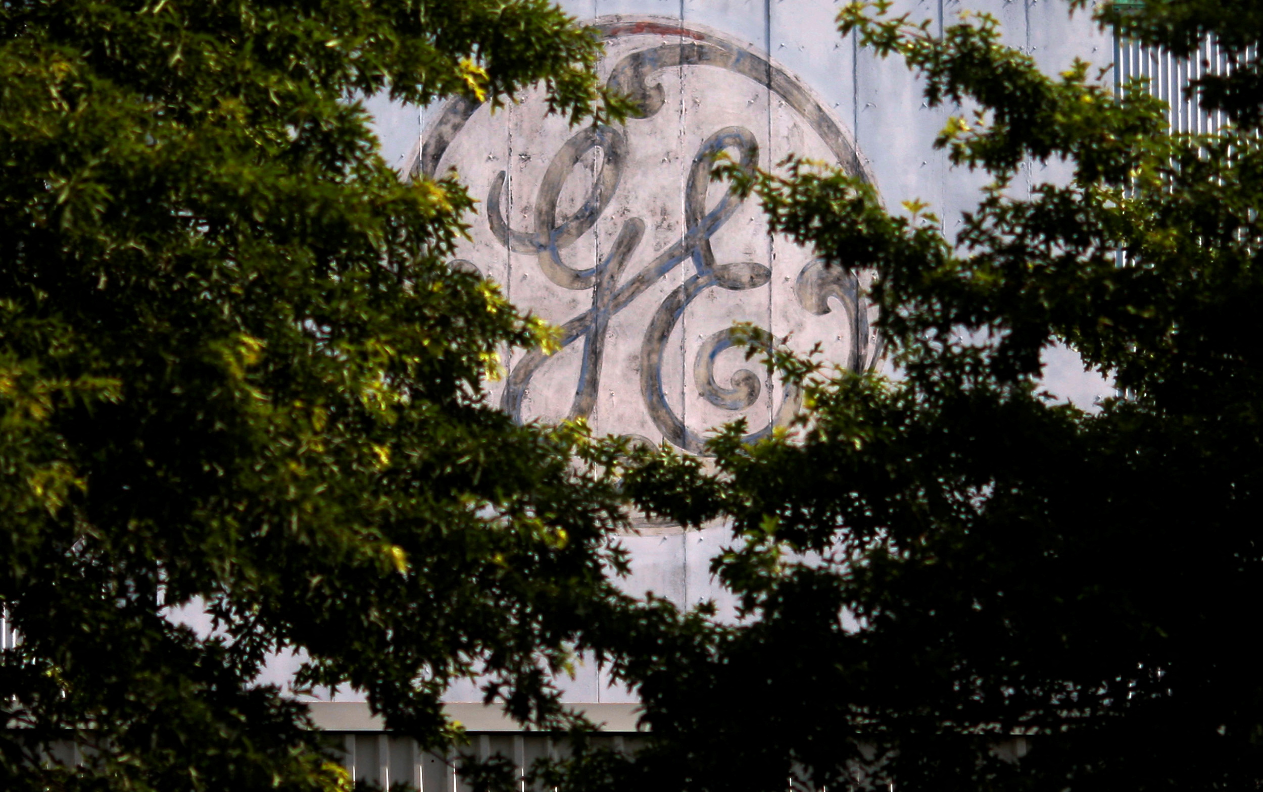 A logo sits over the entrance to a General Electric Co. facility in Medford