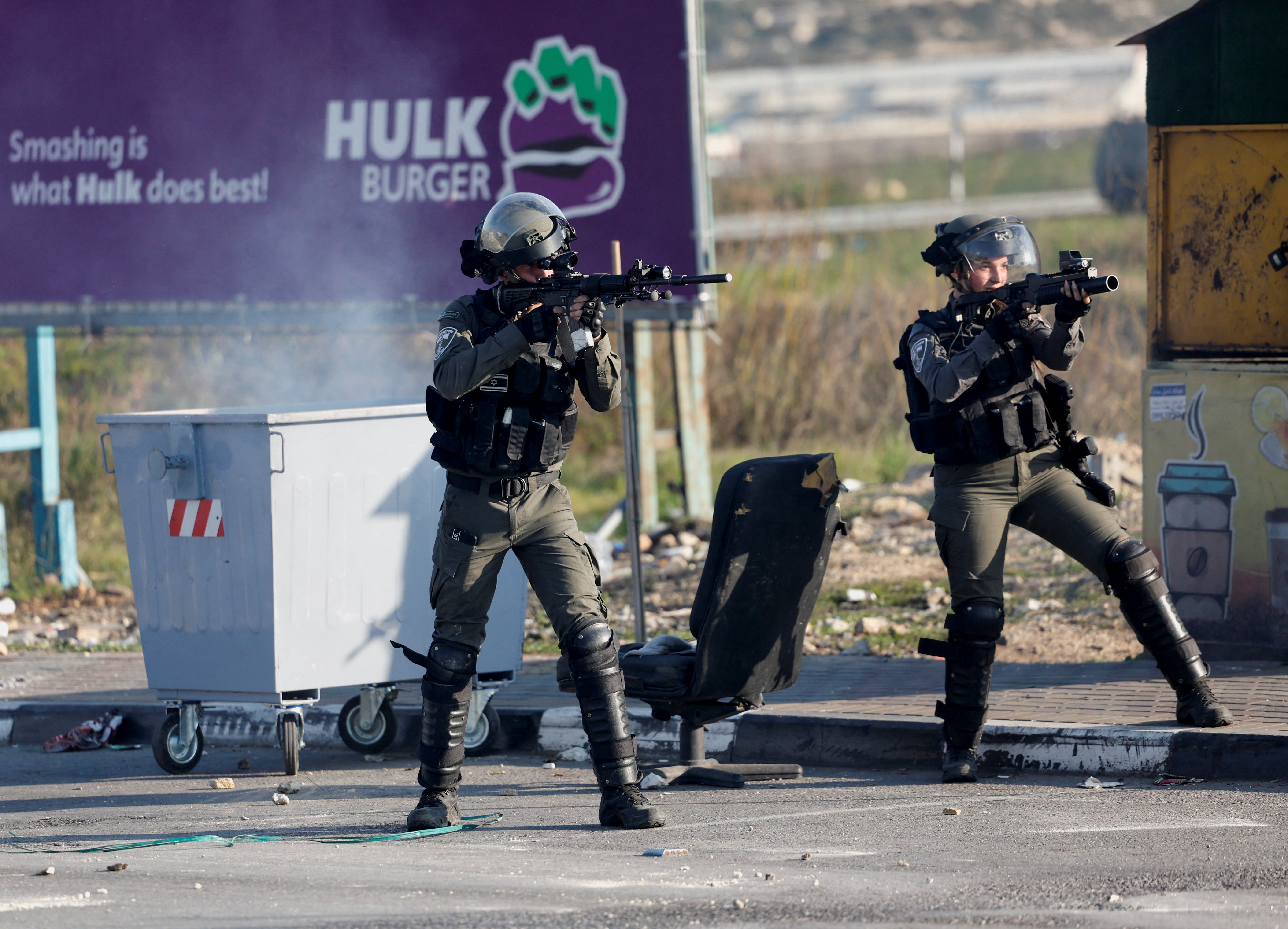 Palestinians clash with Israeli troops near Ramallah in the Israeli-occupied West Bank