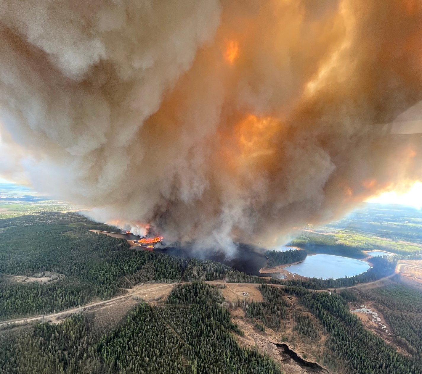 Fire and floods across western Canada force evacuations Reuters