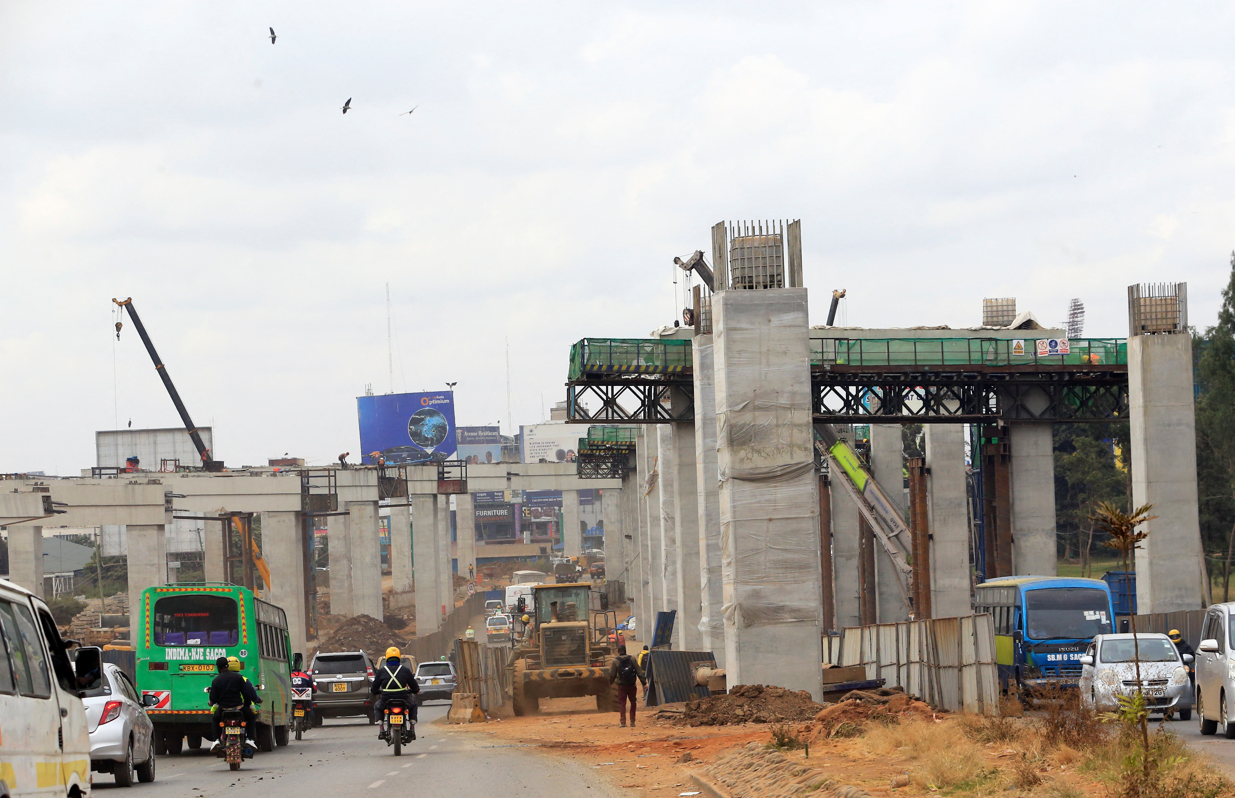 Motorists drive on the controlled section during the construction of the Nairobi Expressway in Nairobi