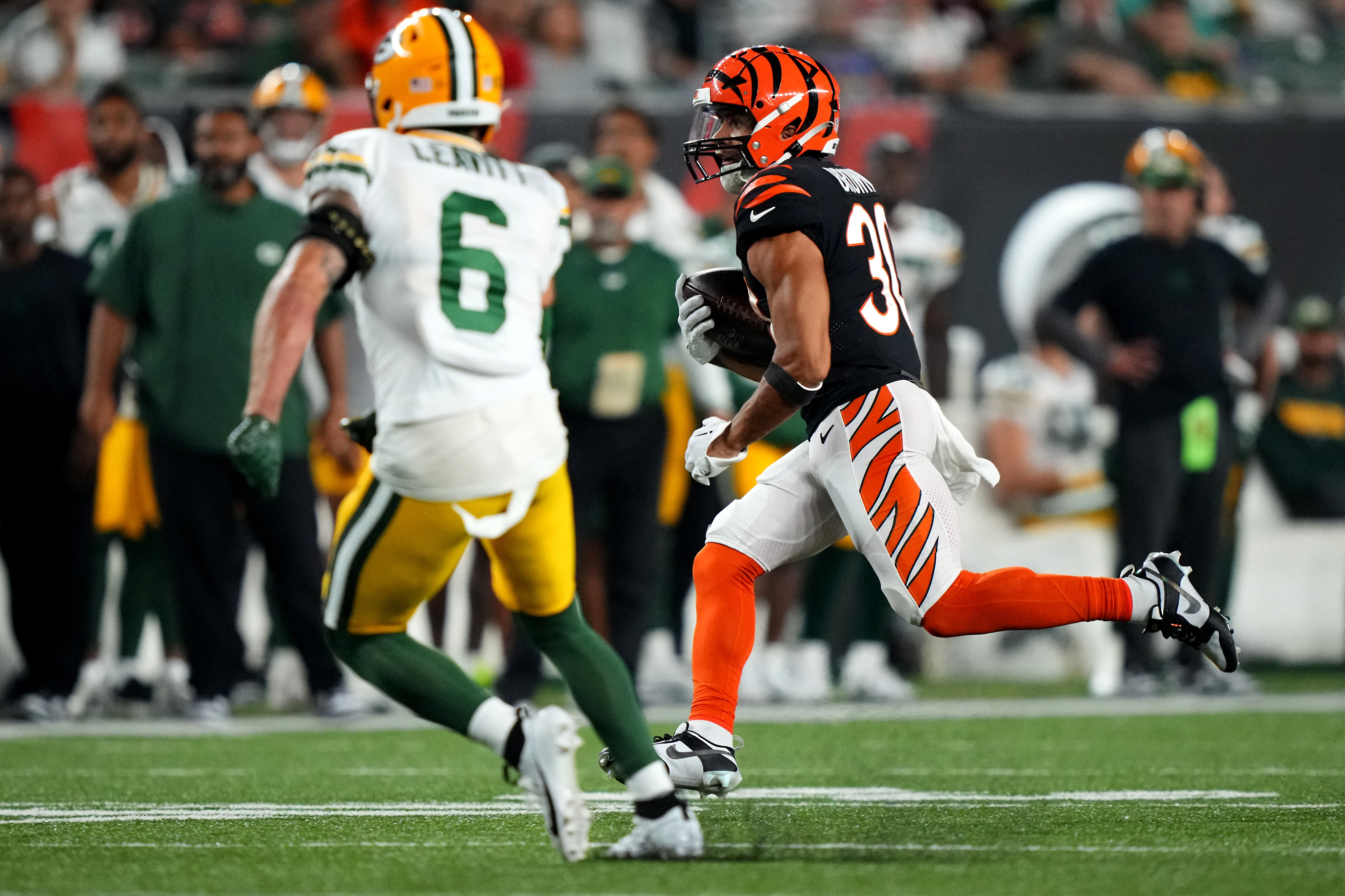 Emanuel Wilson of the Green Bay Packers rushes the ball against