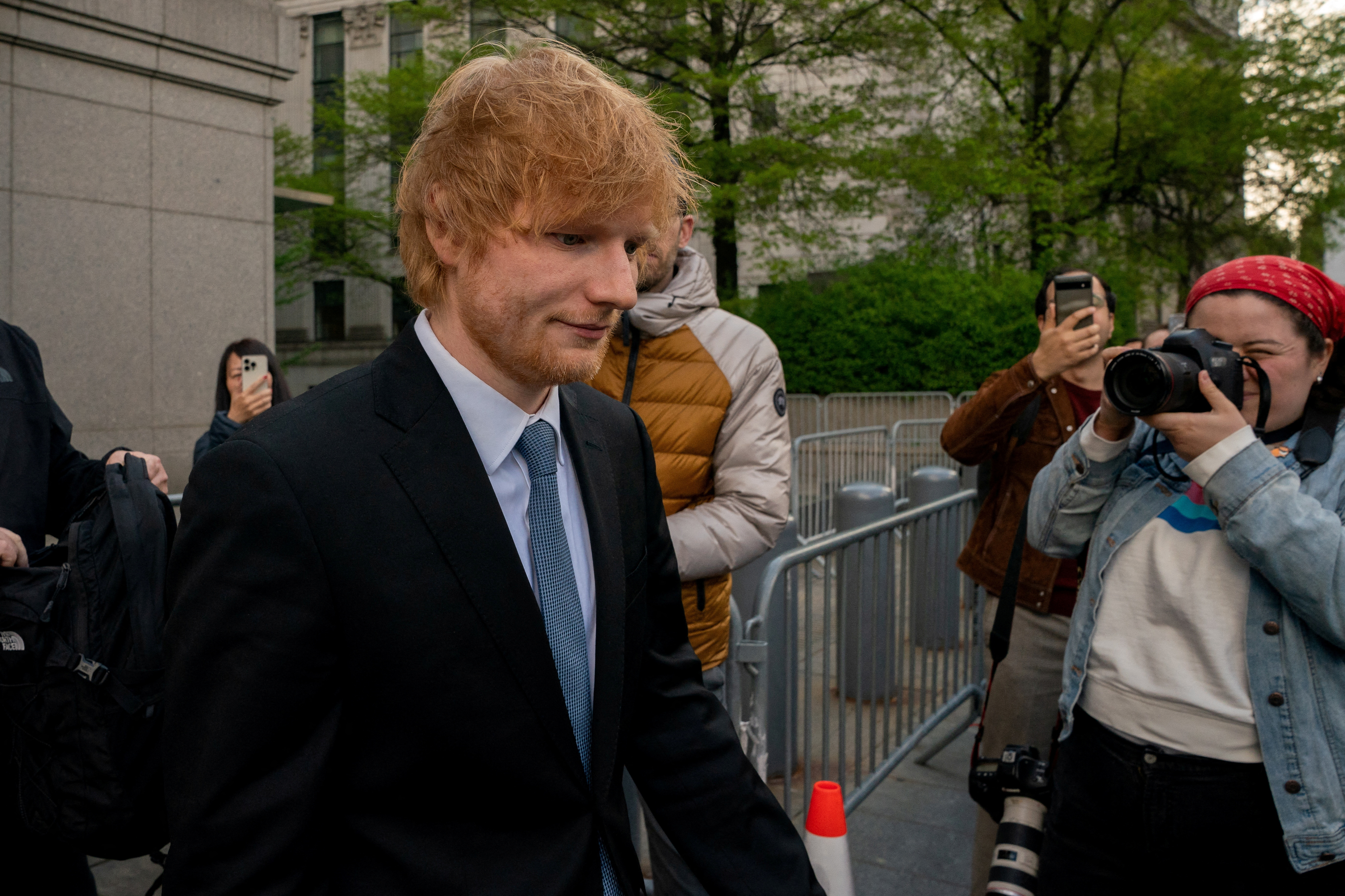Singer Sheeran departs Federal Court in New York