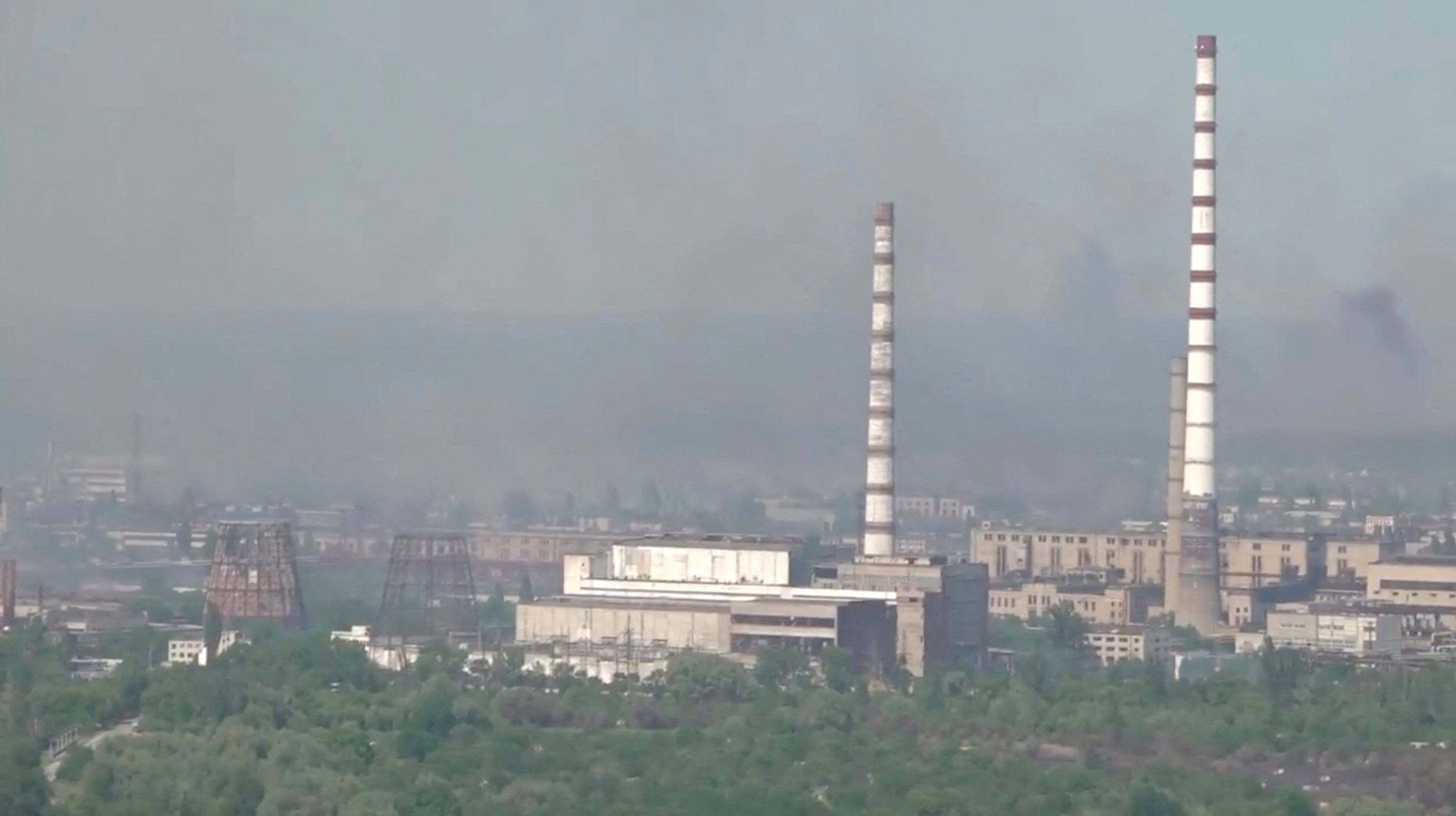 Black smoke billows over Sievierodonetsk Azot chemical plant as Russia's invasion on Ukraine continues, in Sievierodonetsk