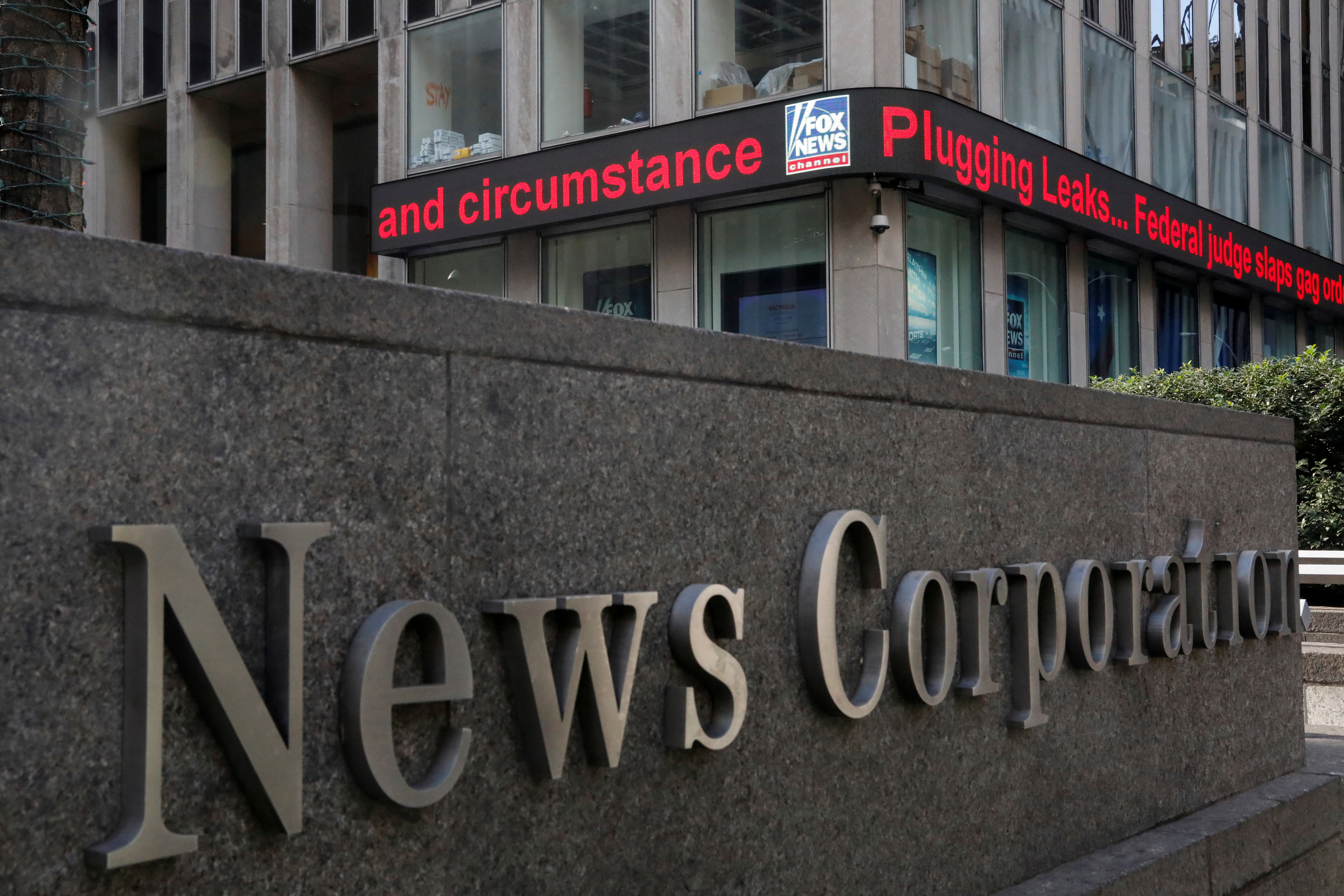 The Fox News electronic ticker is seen outside the News Corporation building in New York City