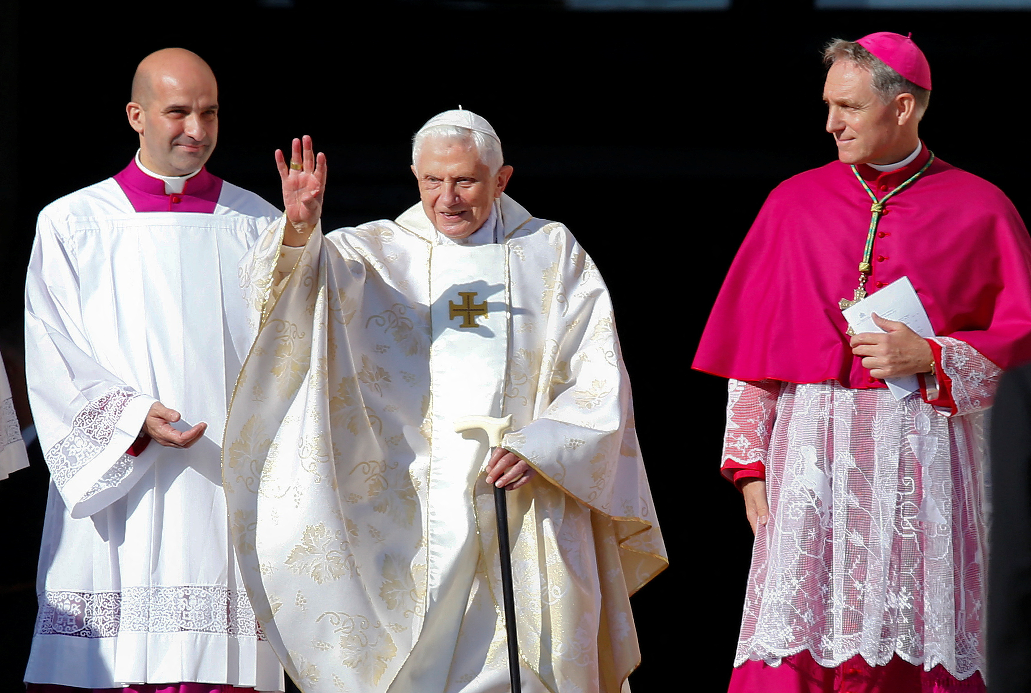 Emeritus Pope Benedict XVI waves as he arrives to attend a mass for the beatification of former pope Paul VI in St. Peter's square at the Vatican