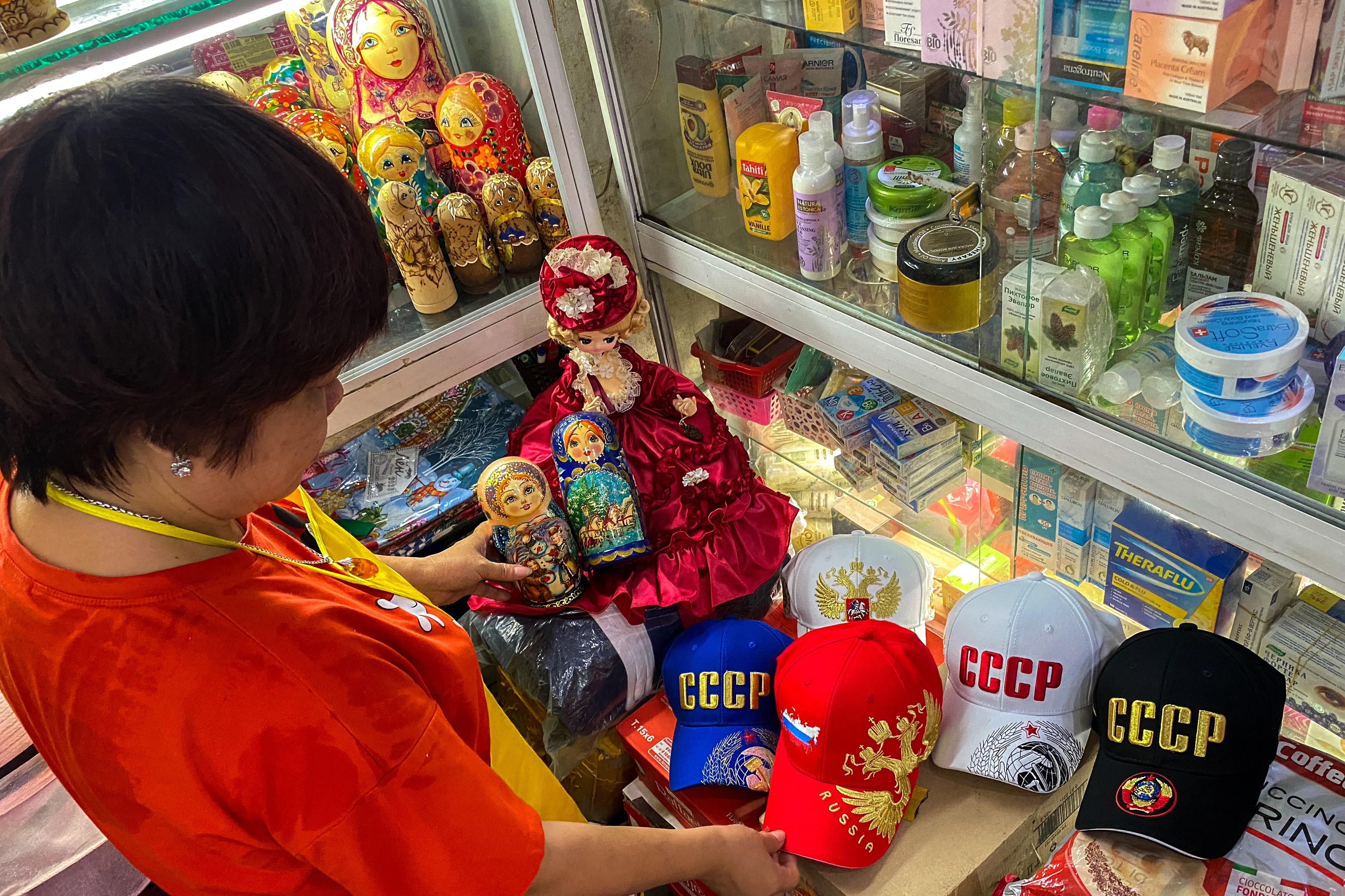 Nguyen Thi Hong Van, a collector and seller of Russian souvenirs who lived and worked in Russia for 20 years, at her shop in Hanoi