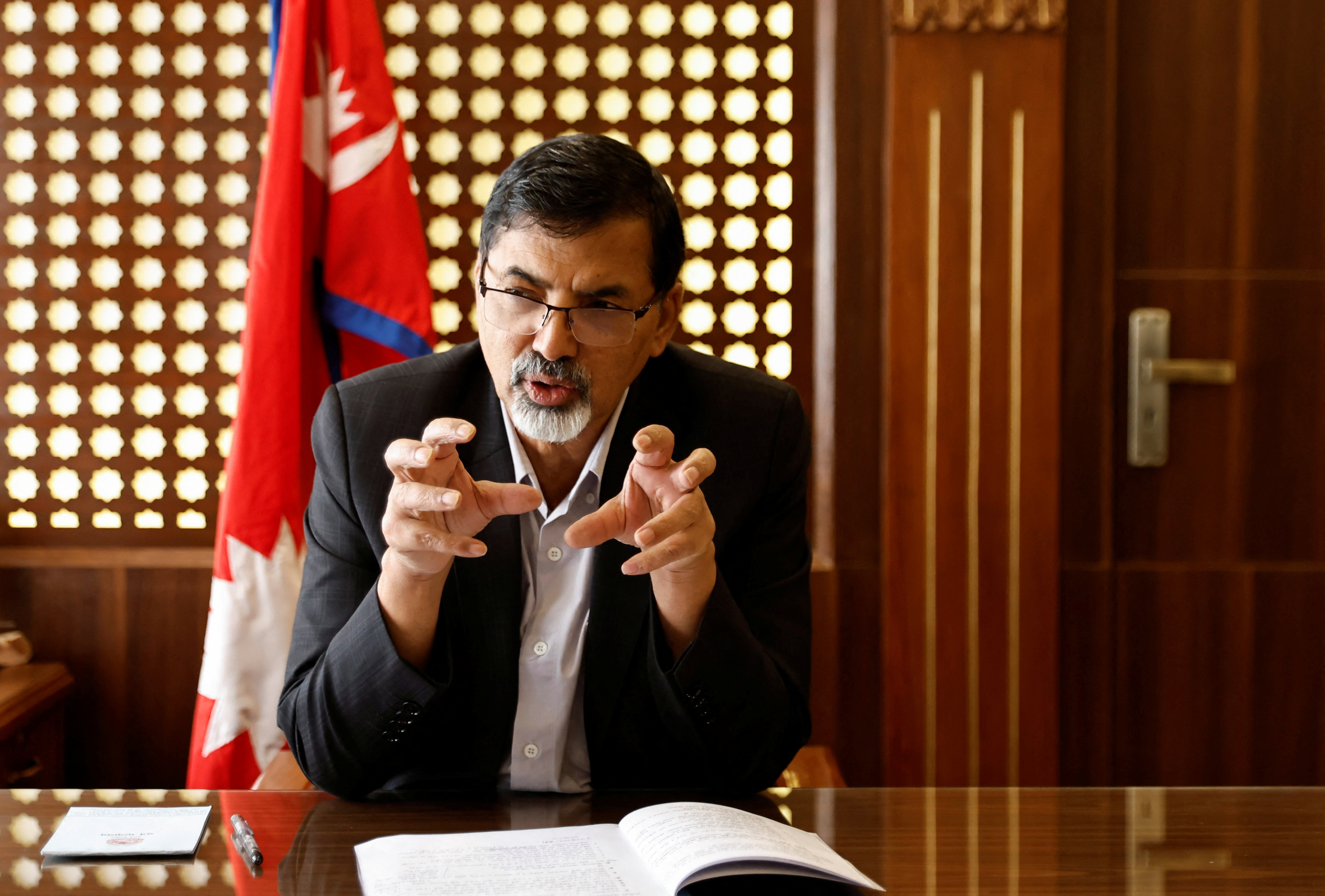 Nepal’s Finance Minister Janardan Sharma speaks during an interview with Reuters at his office in Kathmandu