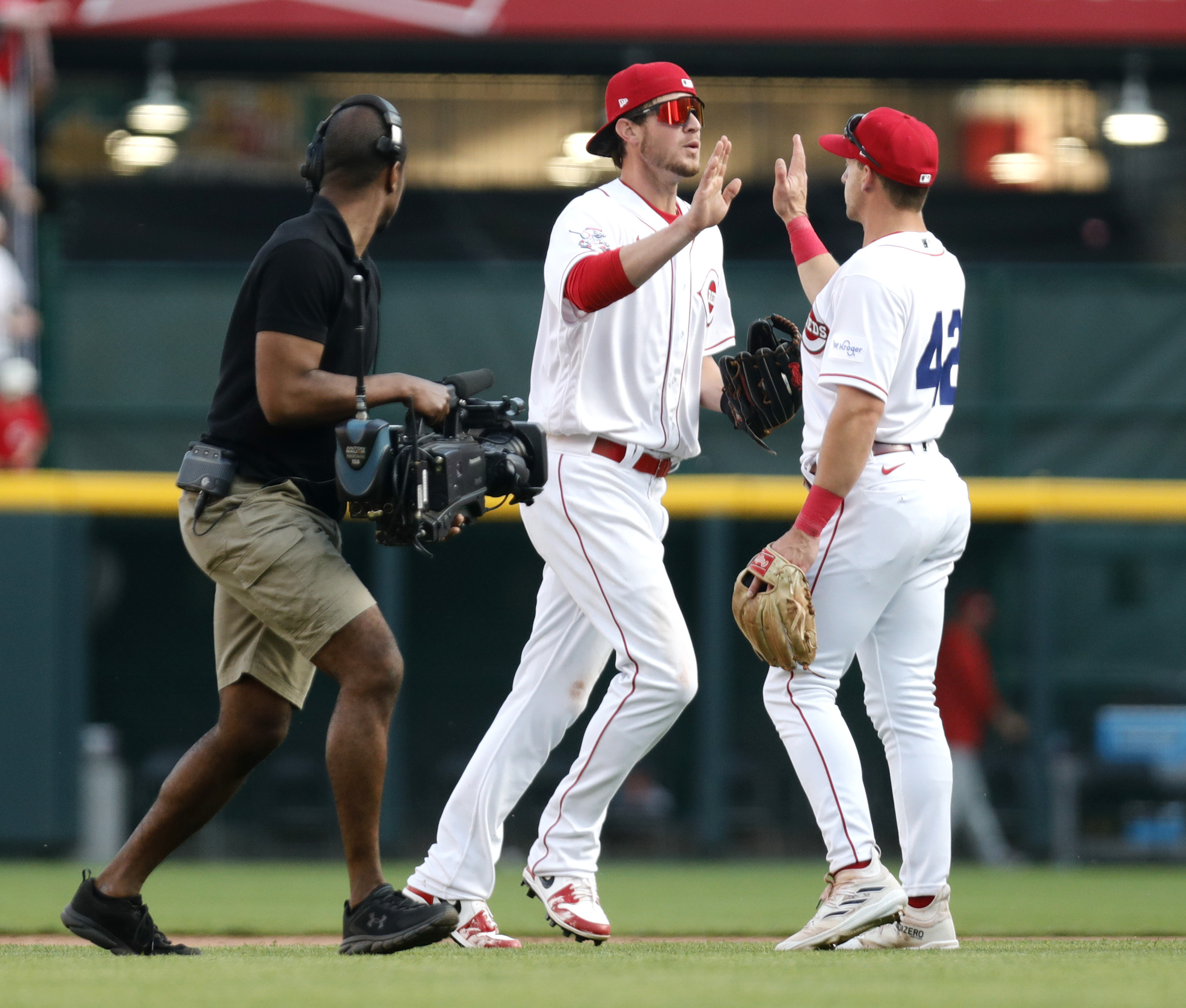 Myers homers twice, leads Reds in 13-0 rout of Phillies