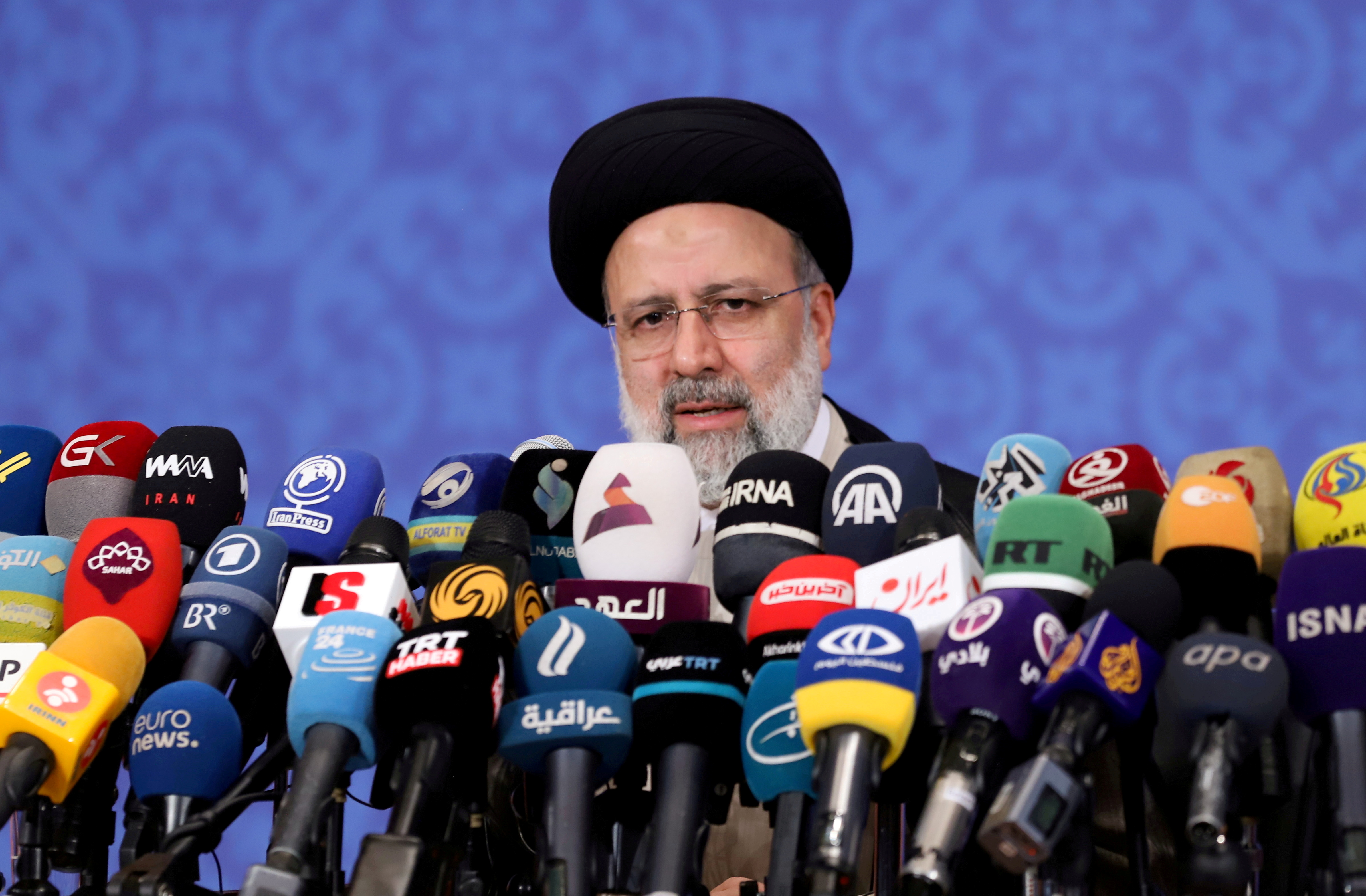 Iran's Ebrahim Raisi speaks during a news conference in Tehran