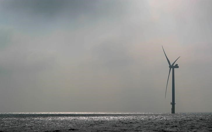 A power-generating windmill turbine is seen at the Eneco Luchterduinen offshore wind farm near Amsterdam