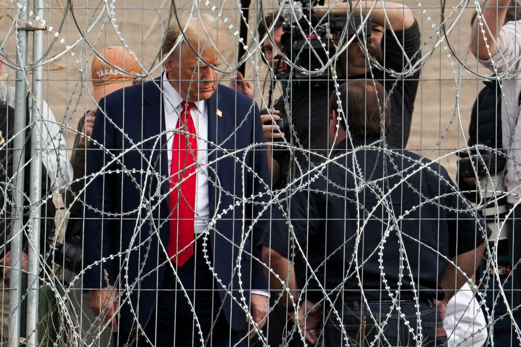 Biden pressures Trump to unblock migrant plan during dueling
