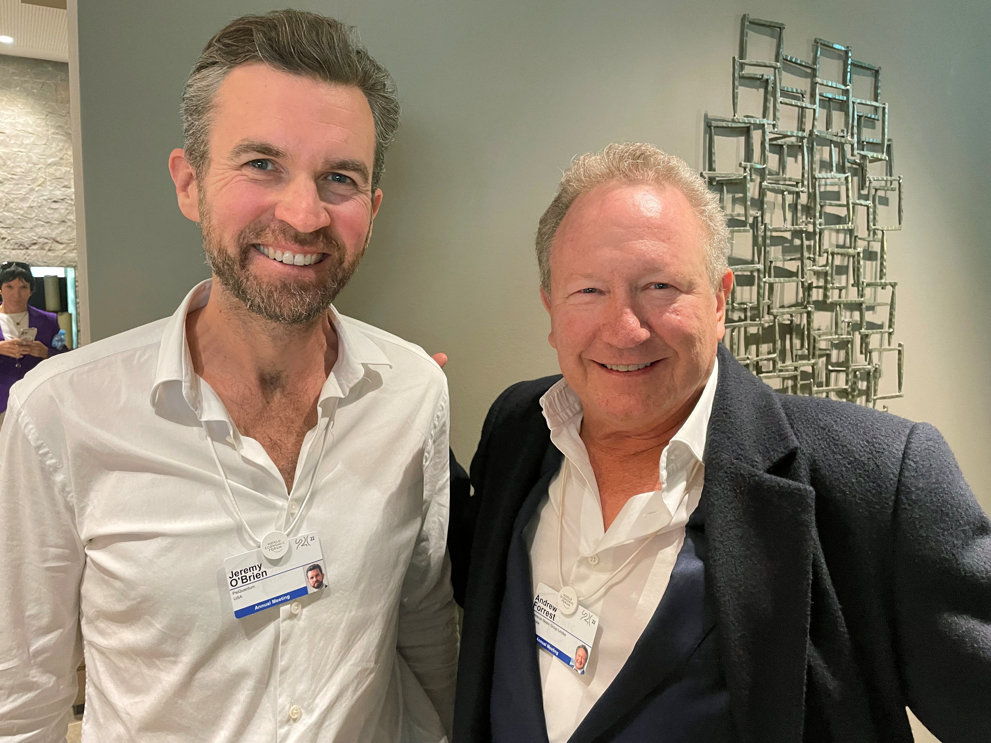 Founder of Australia's Fortescue Metals Group Andrew Forrest poses together with Jeremy O'Brien, co-founder of Silicon Valley-based PsiQuantum in the Alpine resort of Davos