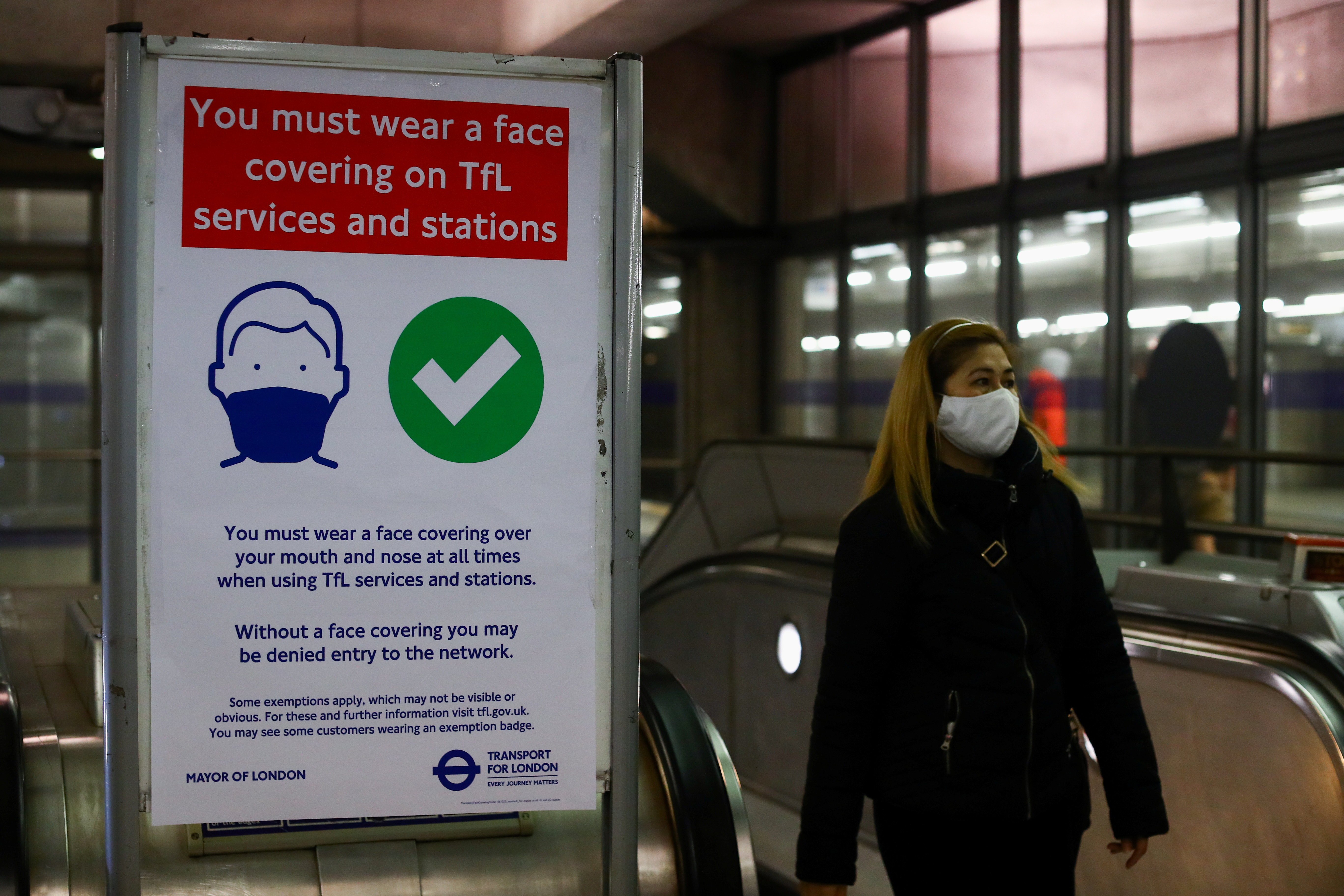 A person wears a face mask on the London underground, as the spread of the coronavirus disease (COVID-19) continues in London, Britain, November 29, 2021. REUTERS/Hannah McKay