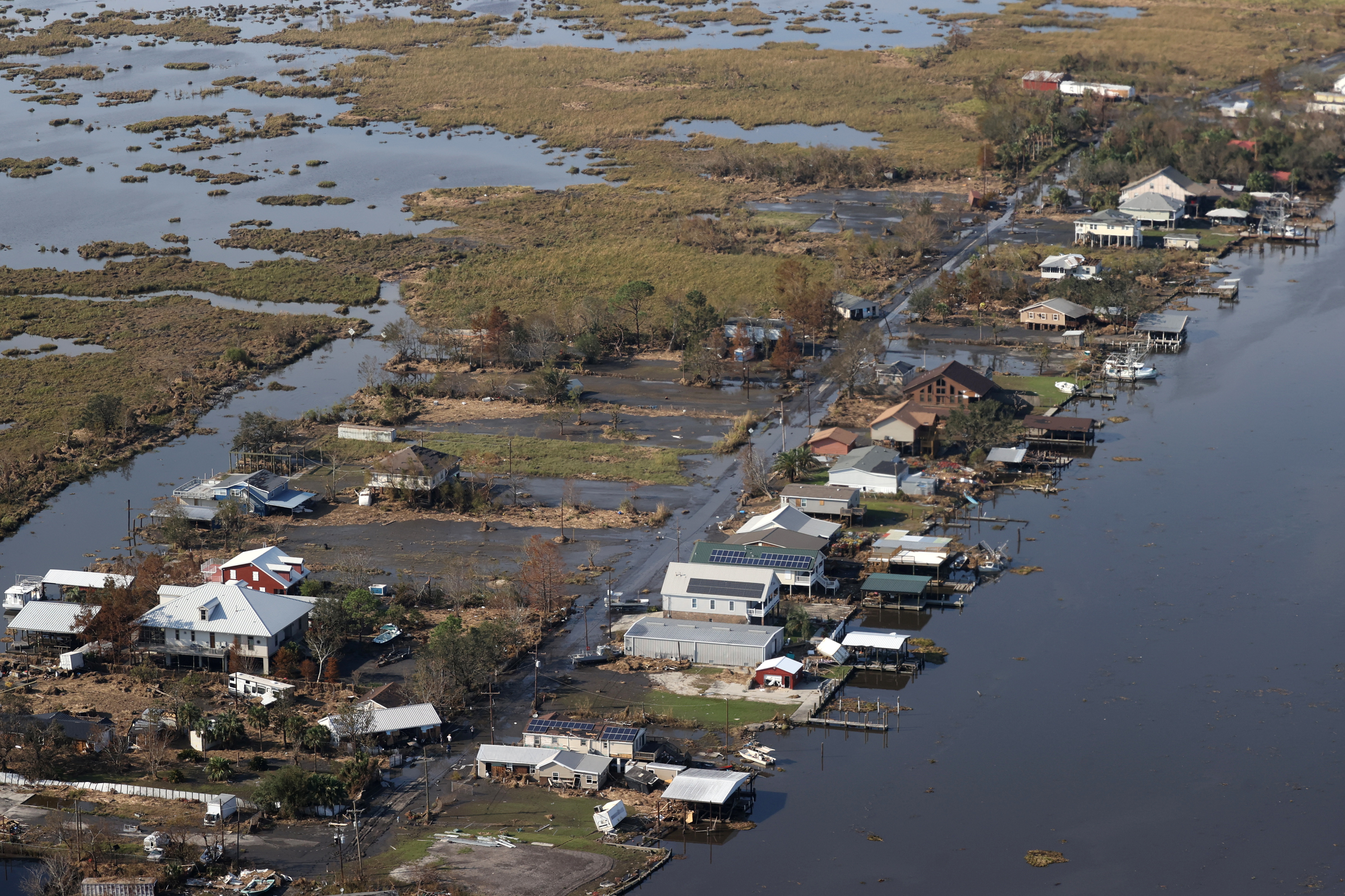 A view shows debris and buildings damaged from Hurricane Ida during U.S. President Joe Biden's aerial tour of communities in Laffite, Grand Isle, Port Fourchon and Lafourche Parish, Louisiana