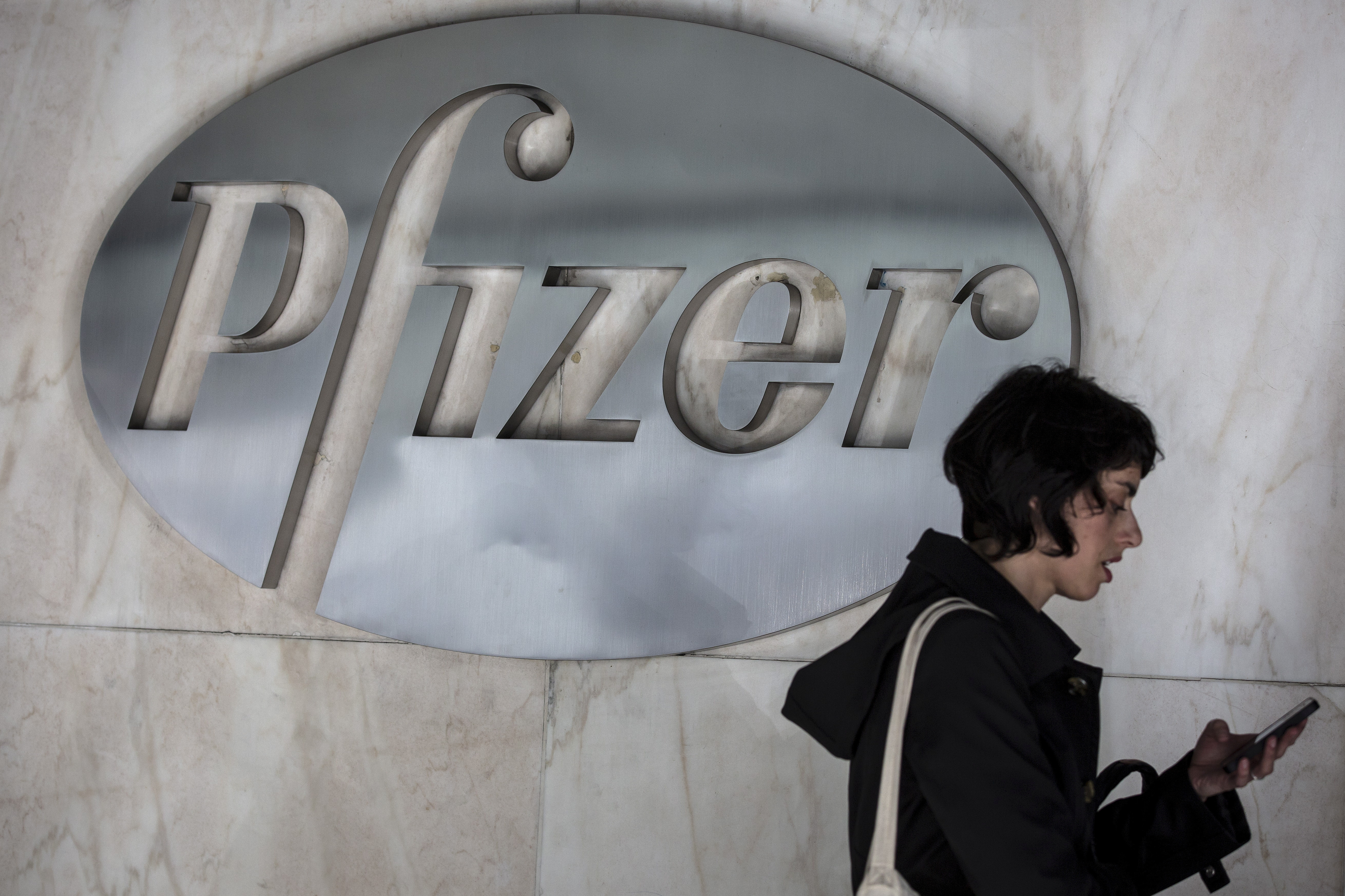 The Pfizer logo is pictured at their building in the Manhattan borough of New York