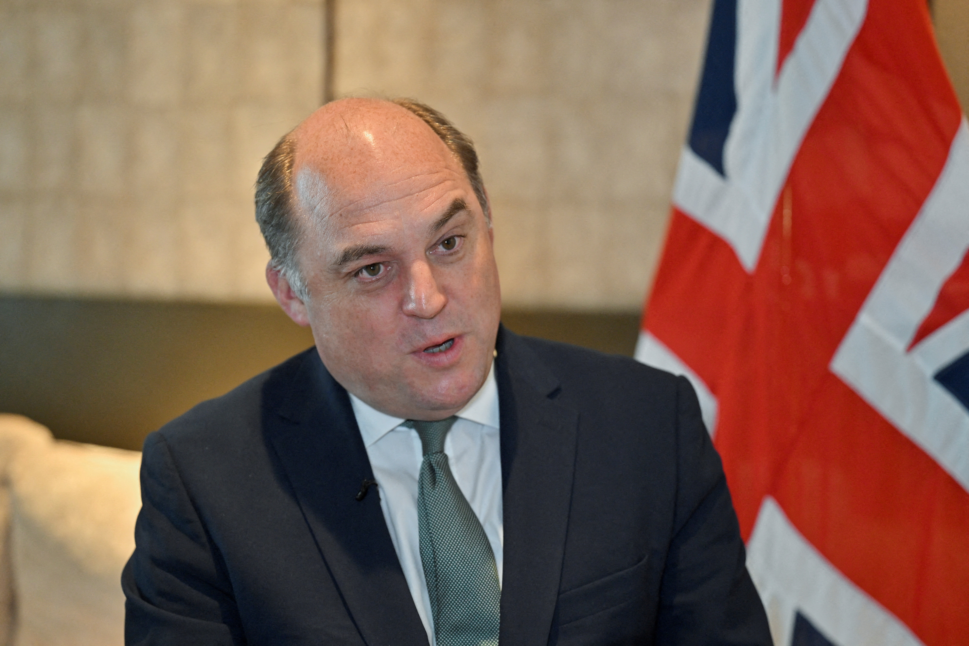 British Secretary of State for Defence Ben Wallace, speaks during an interview with Reuters in Singapore