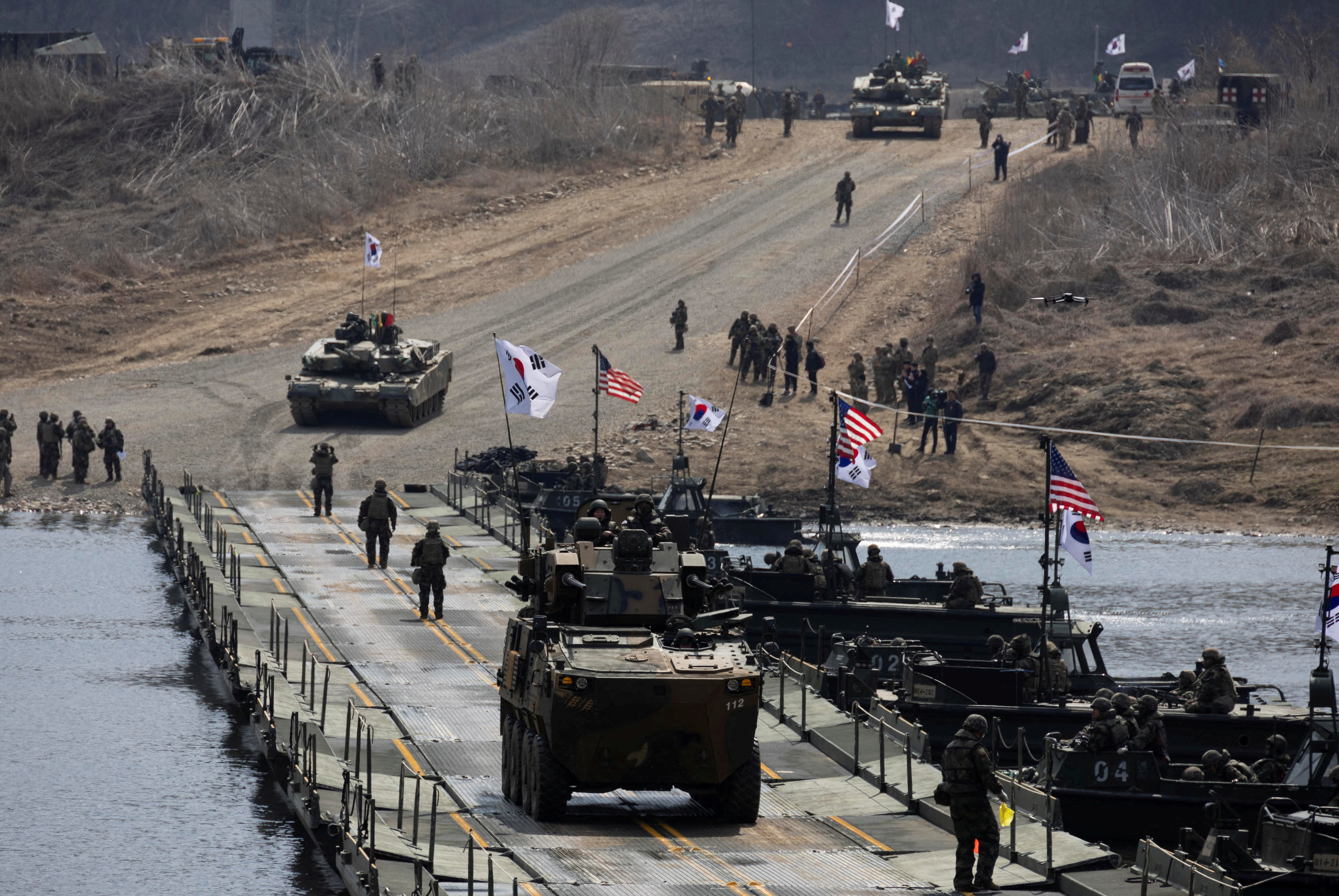 South Korean and US soldiers conduct a joint river-crossing  exercise in Yeoncheon