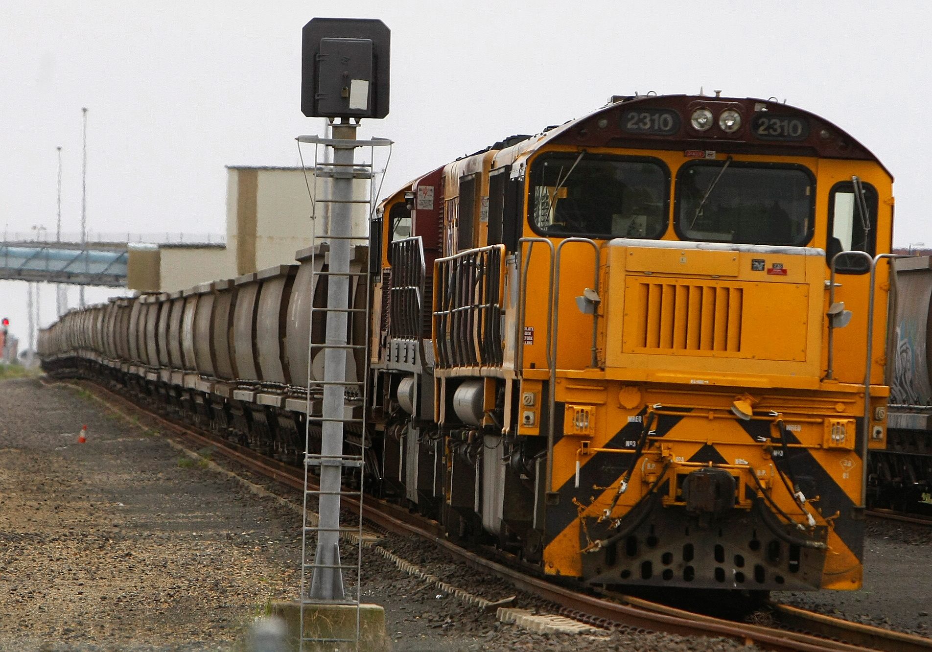An empty coal train sits on the tracks at the Port of Brisbane