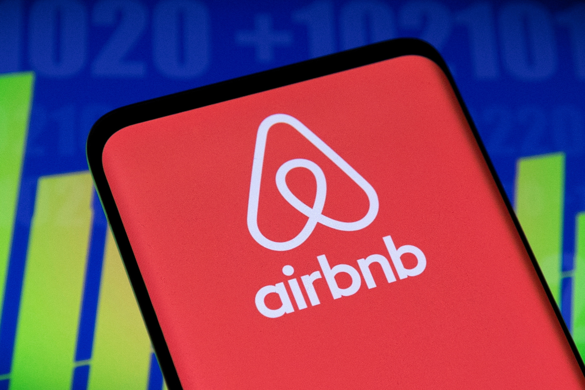 Illustration shows Airbnb logo