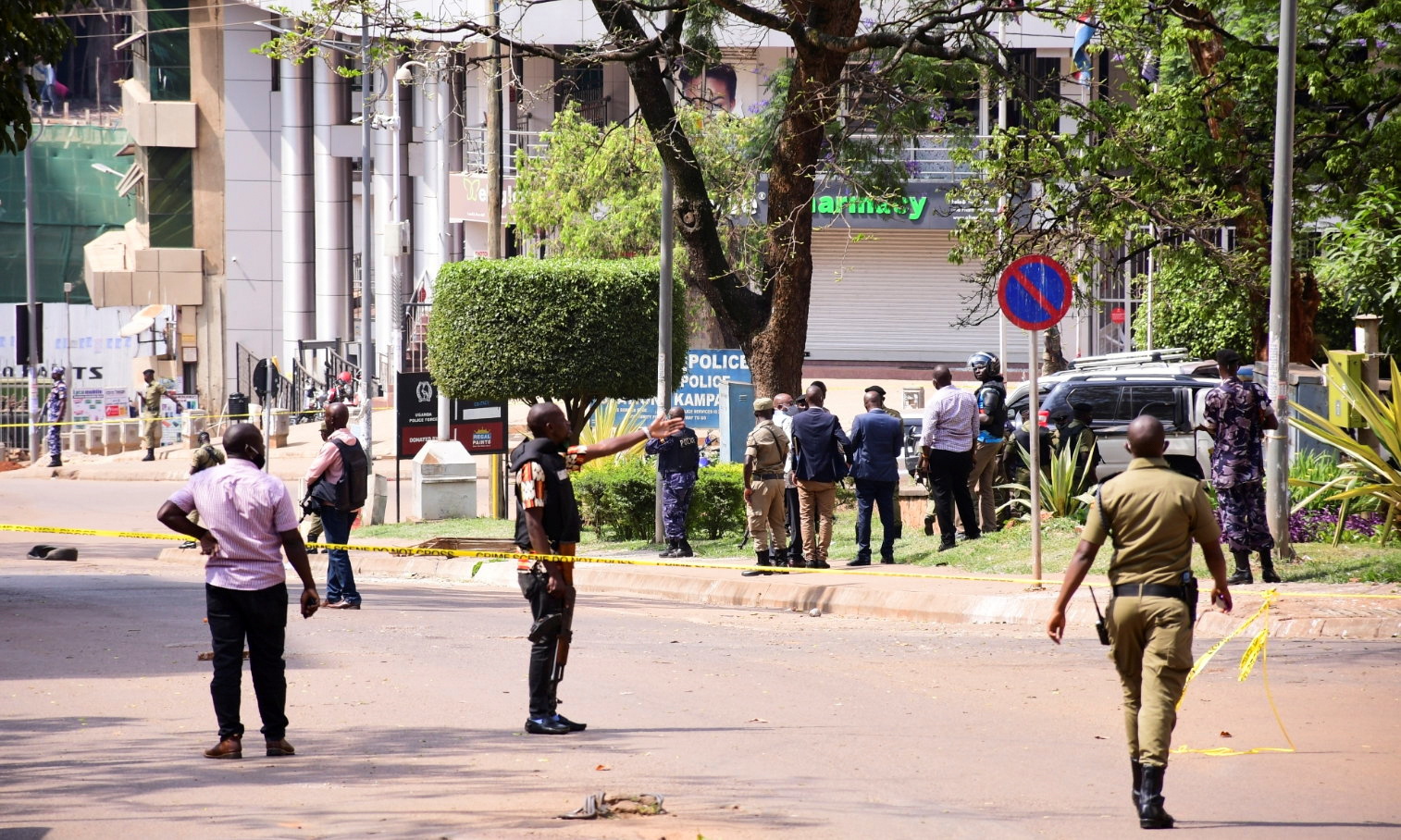 Ugandan police and explosion experts secure the scene of a blast in Kampala, Uganda November 16, 2021. REUTERS/Abubaker Lubowa