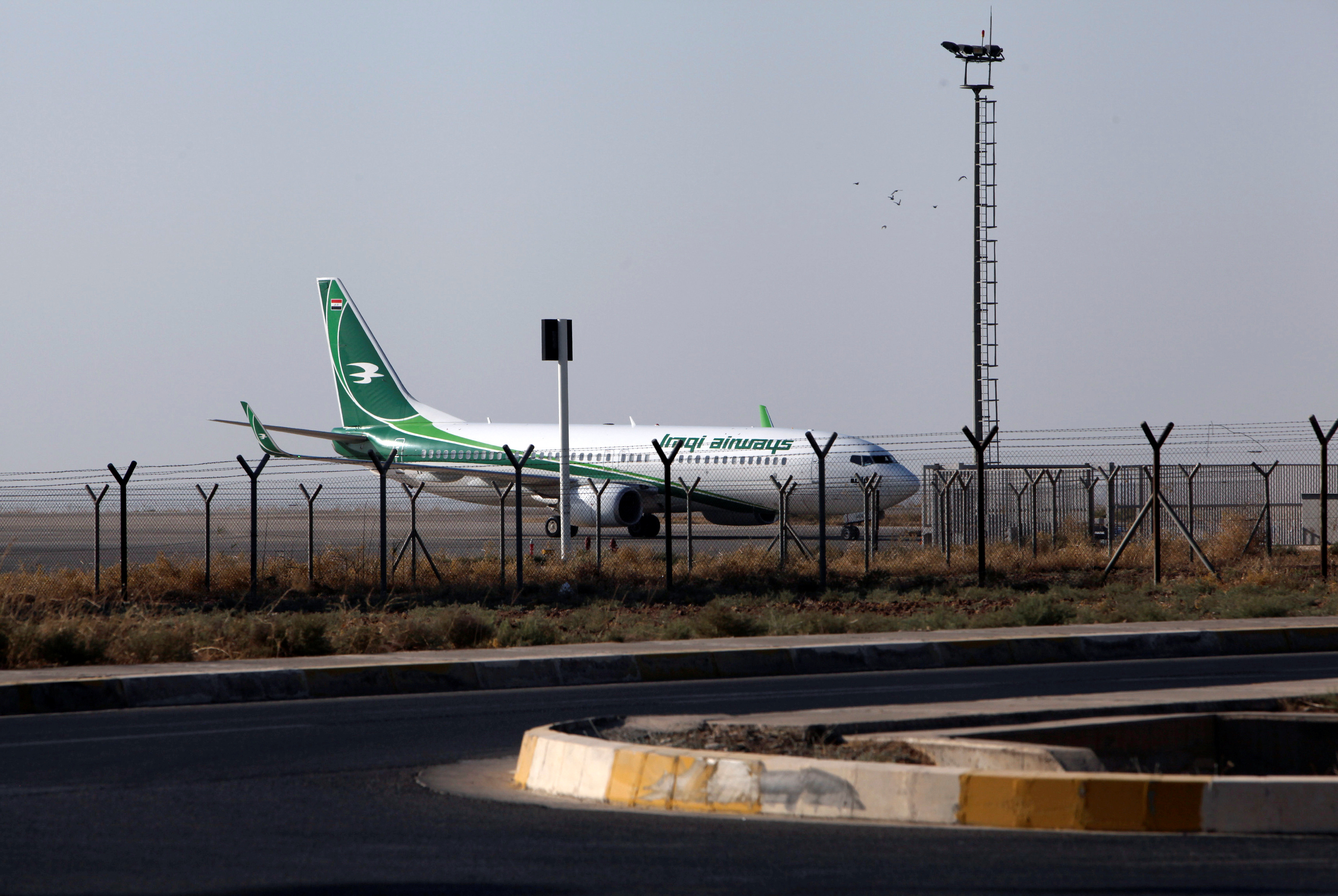 An Iraqi Airways plane is seen at the Erbil International Airport in Erbil