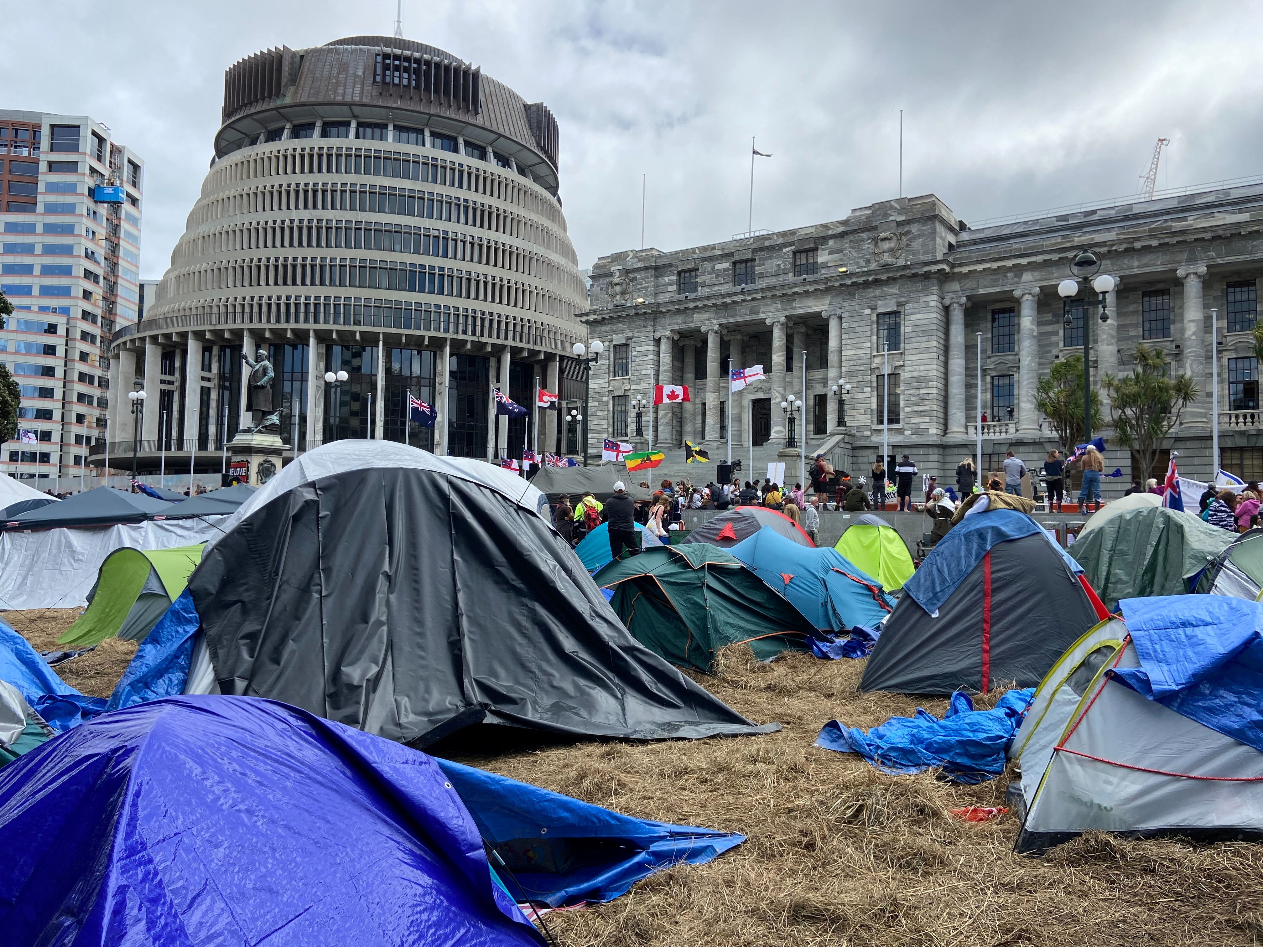 New Zealand’s Ardern labels anti-vaccine protests ‘imported’ as crowds defy calls to leave