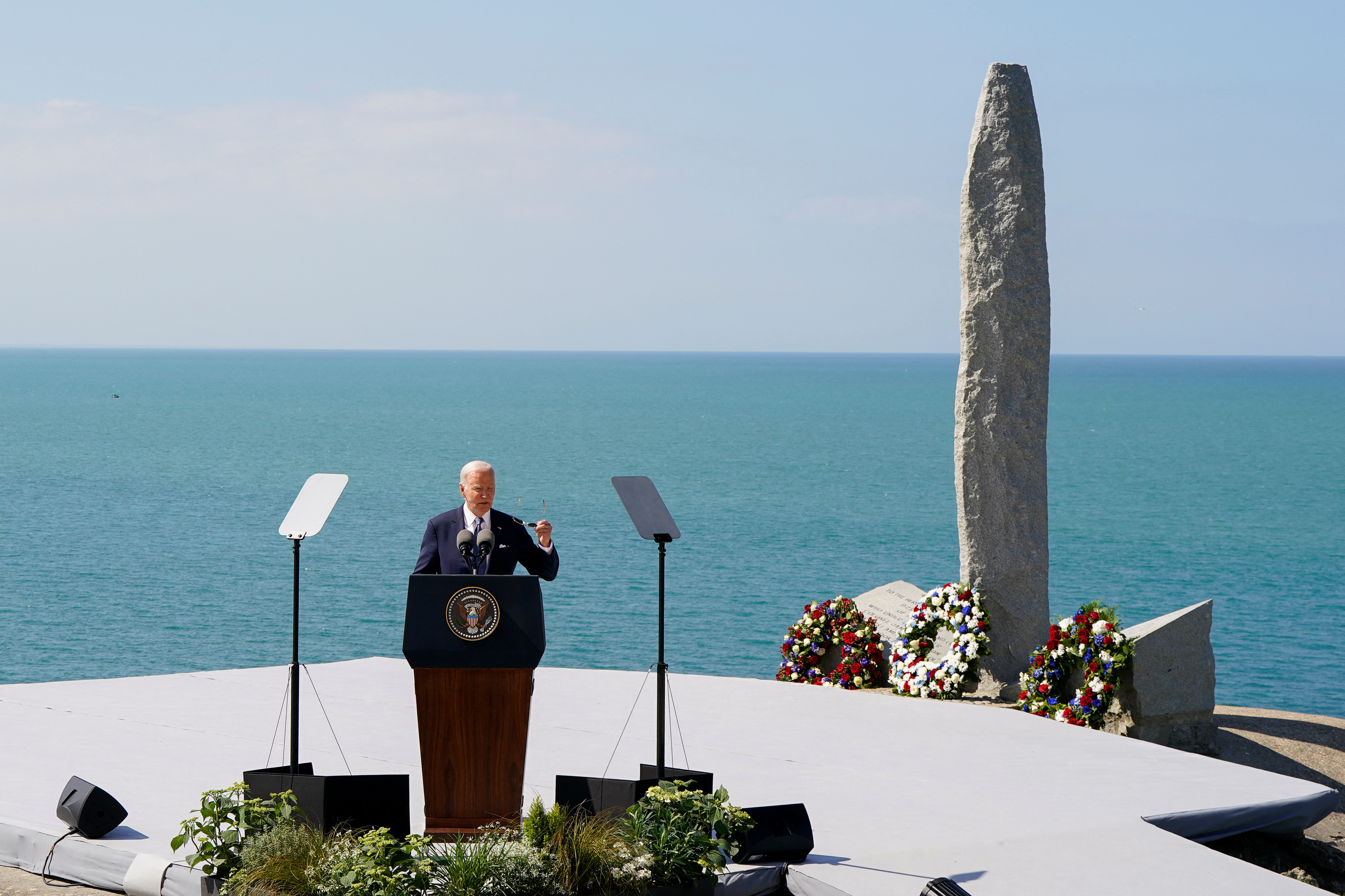 U.S. President Joe Biden delivers remarks at the World War II Pointe du Hoc Ranger Monument, in Cricqueville-en-Bessin