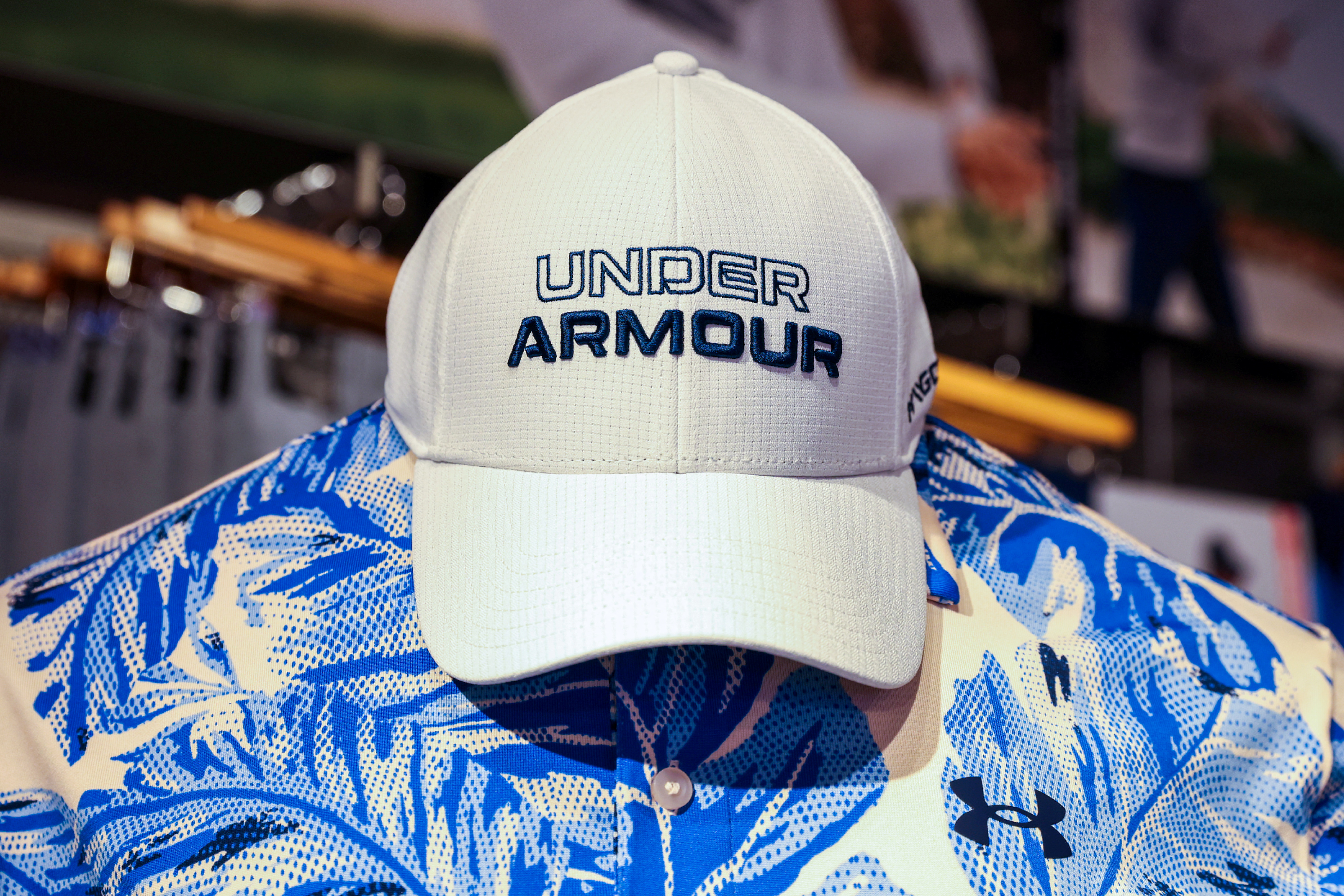 Under Armour cuts on demand, higher Reuters