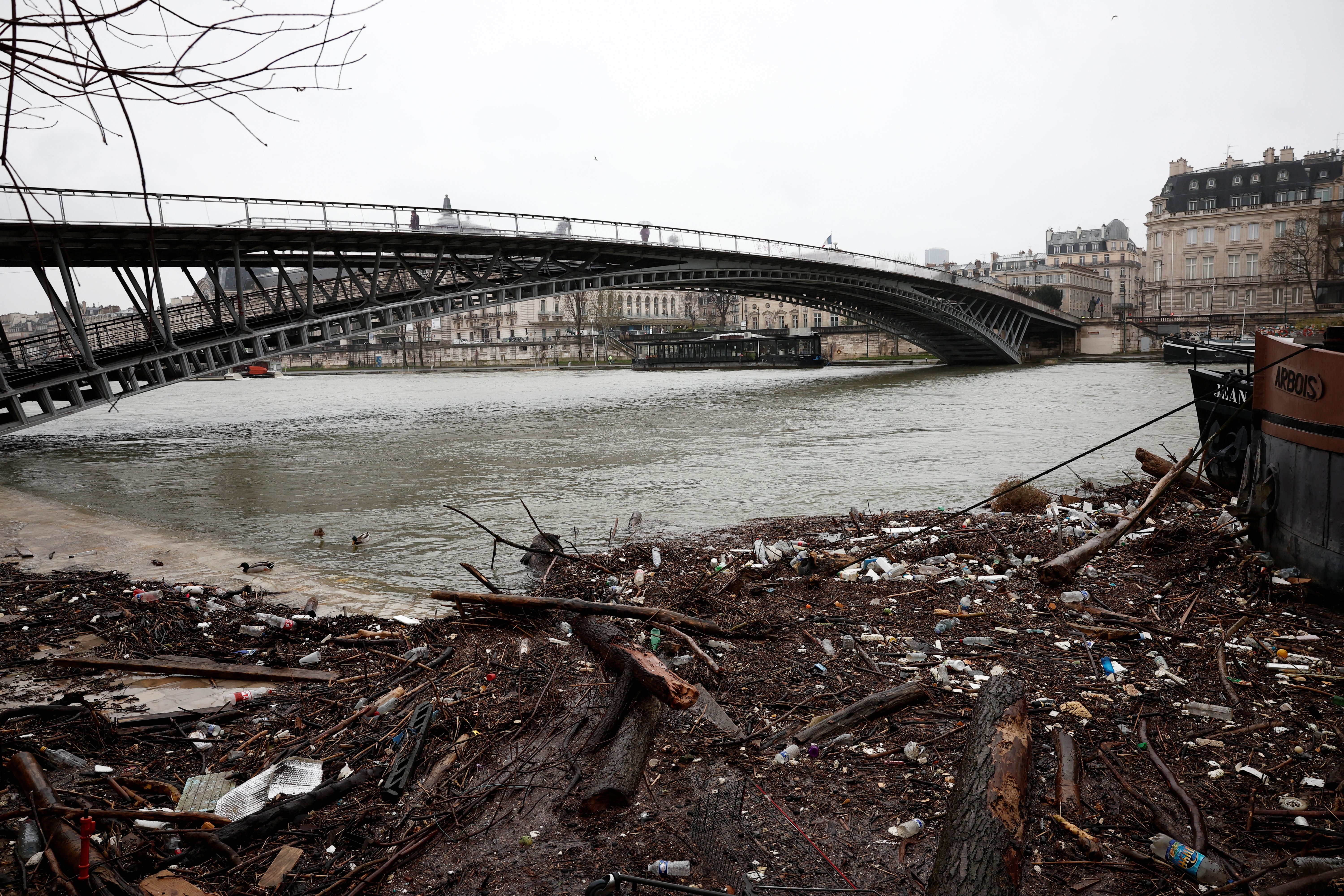 Debris and waste are pictured in the Seine River as the level of river has exceeded the 4-meter mark in Paris