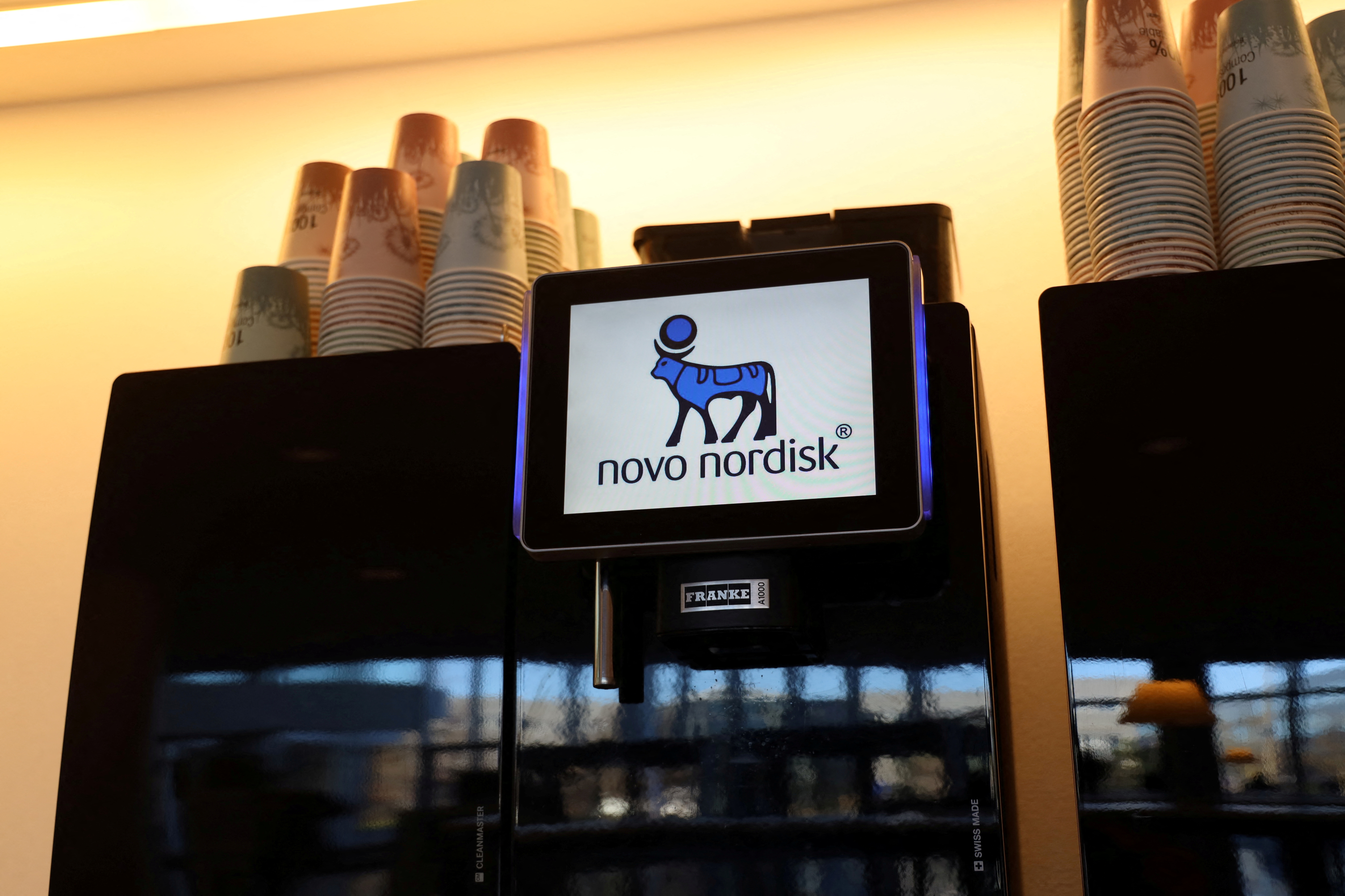 A coffee machine featuring Novo Nordisk logo is seen at the company headquarters in Copenhagen