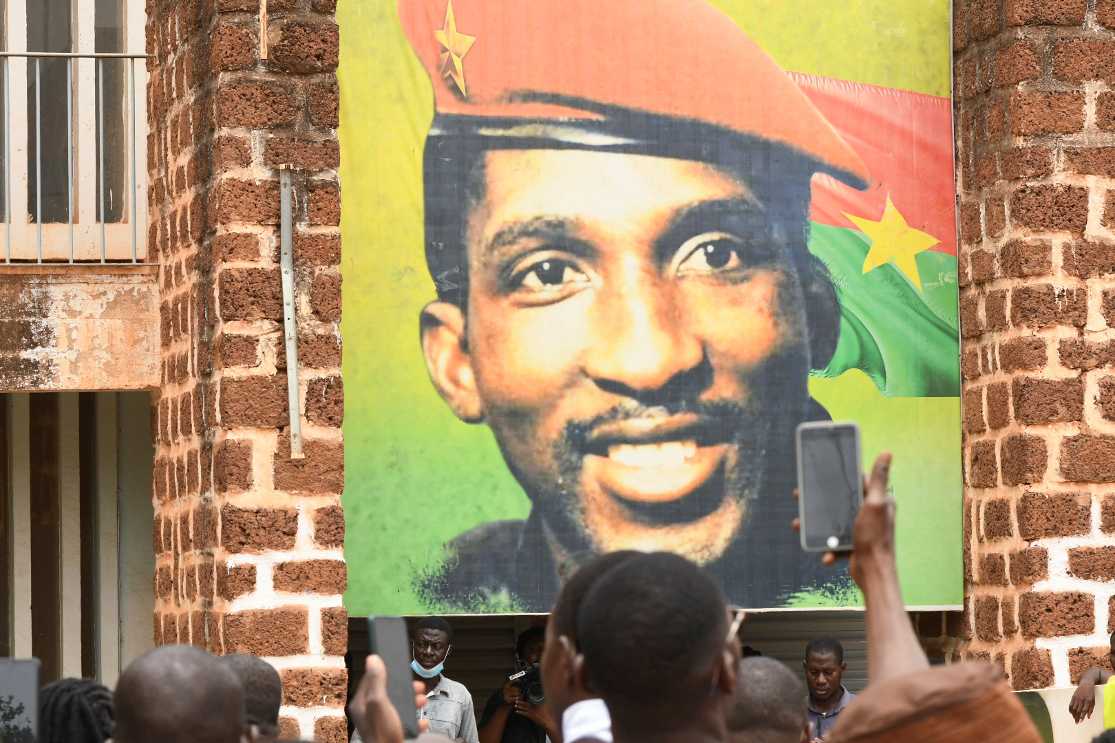 Supporters of the late president Thomas Sankara gather at the his memorial site in Ouagadougou