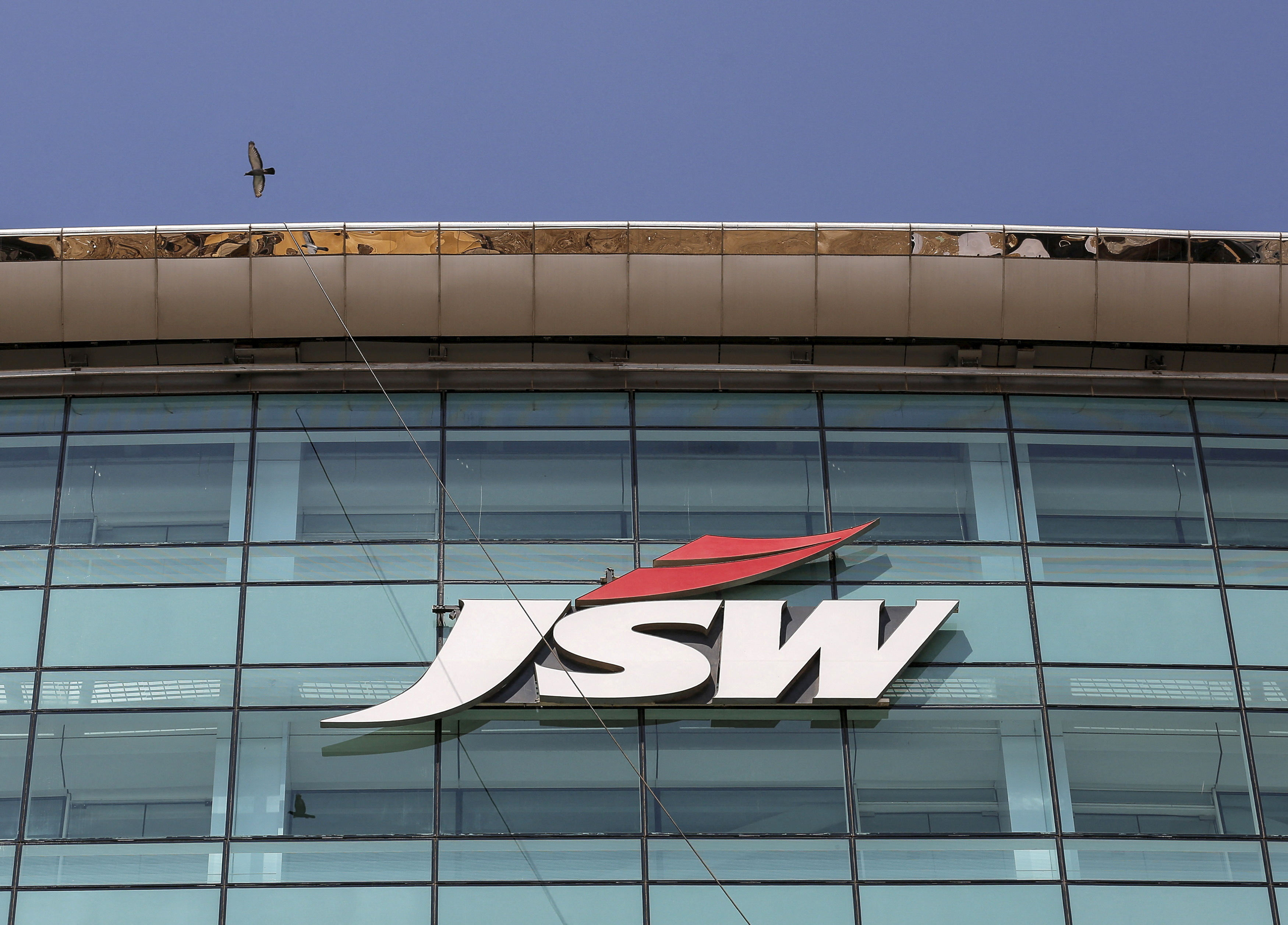 The logo of JSW is seen on the company's headquarters in Mumbai