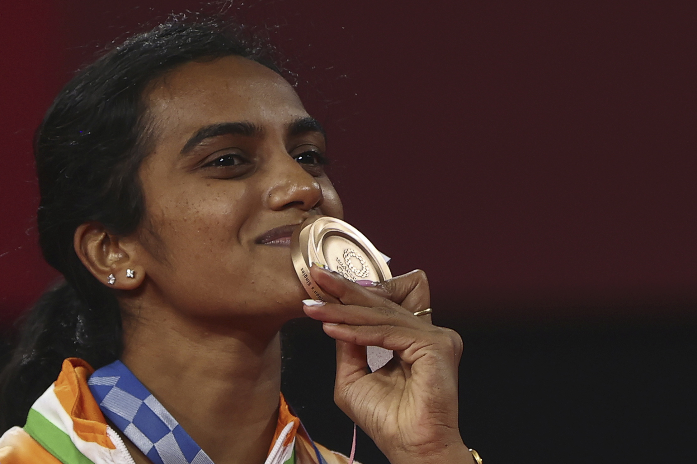 Tokyo 2020 Olympics - Badminton - Women's Singles - Medal Ceremony - MFS - Musashino Forest Sport Plaza, Tokyo, Japan – August 1, 2021. Bronze medallist P.V. Sindhu of India poses with her medal. REUTERS/Leonhard Foeger