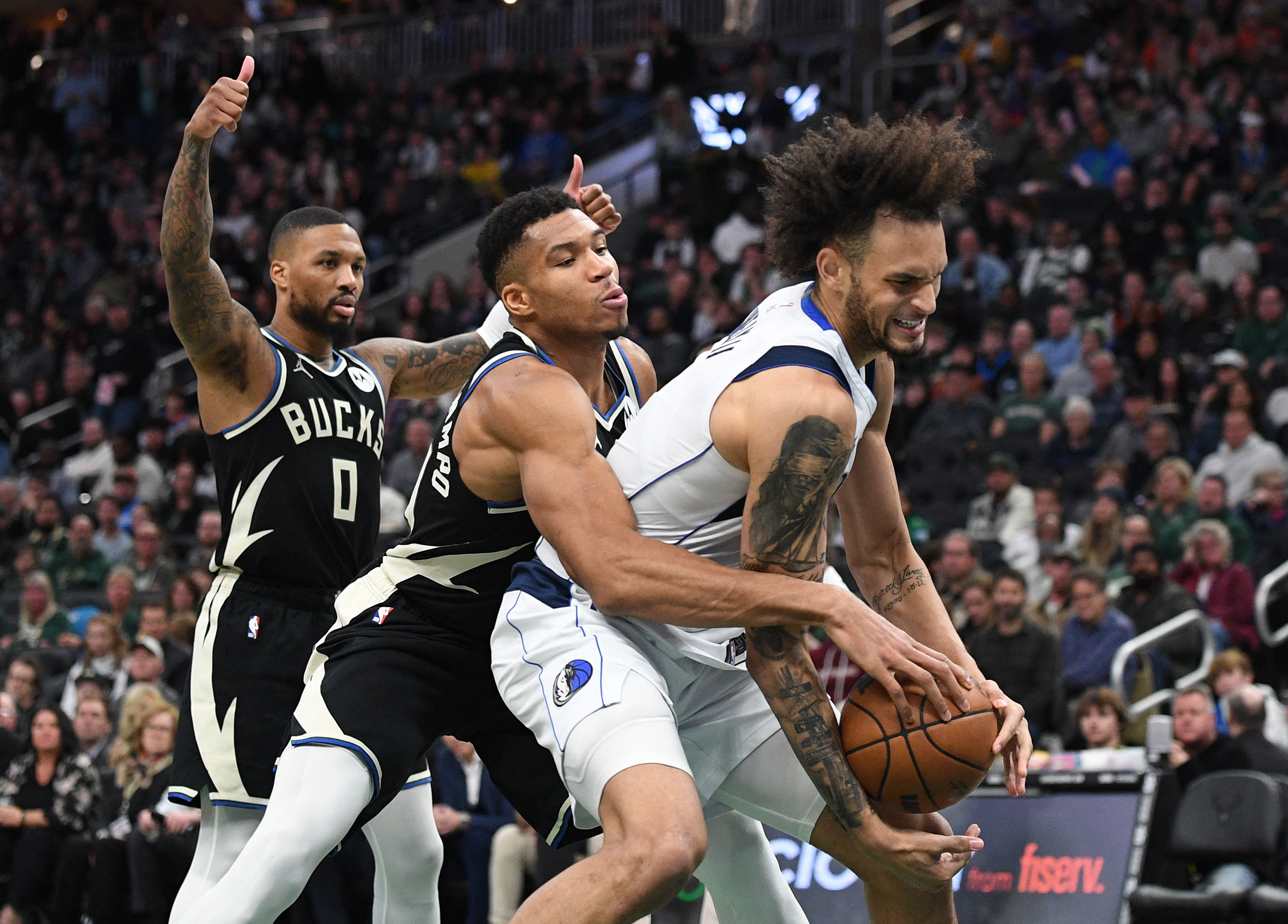 Milwaukee Bucks vs Denver Nuggets photos at Fiserv Forum