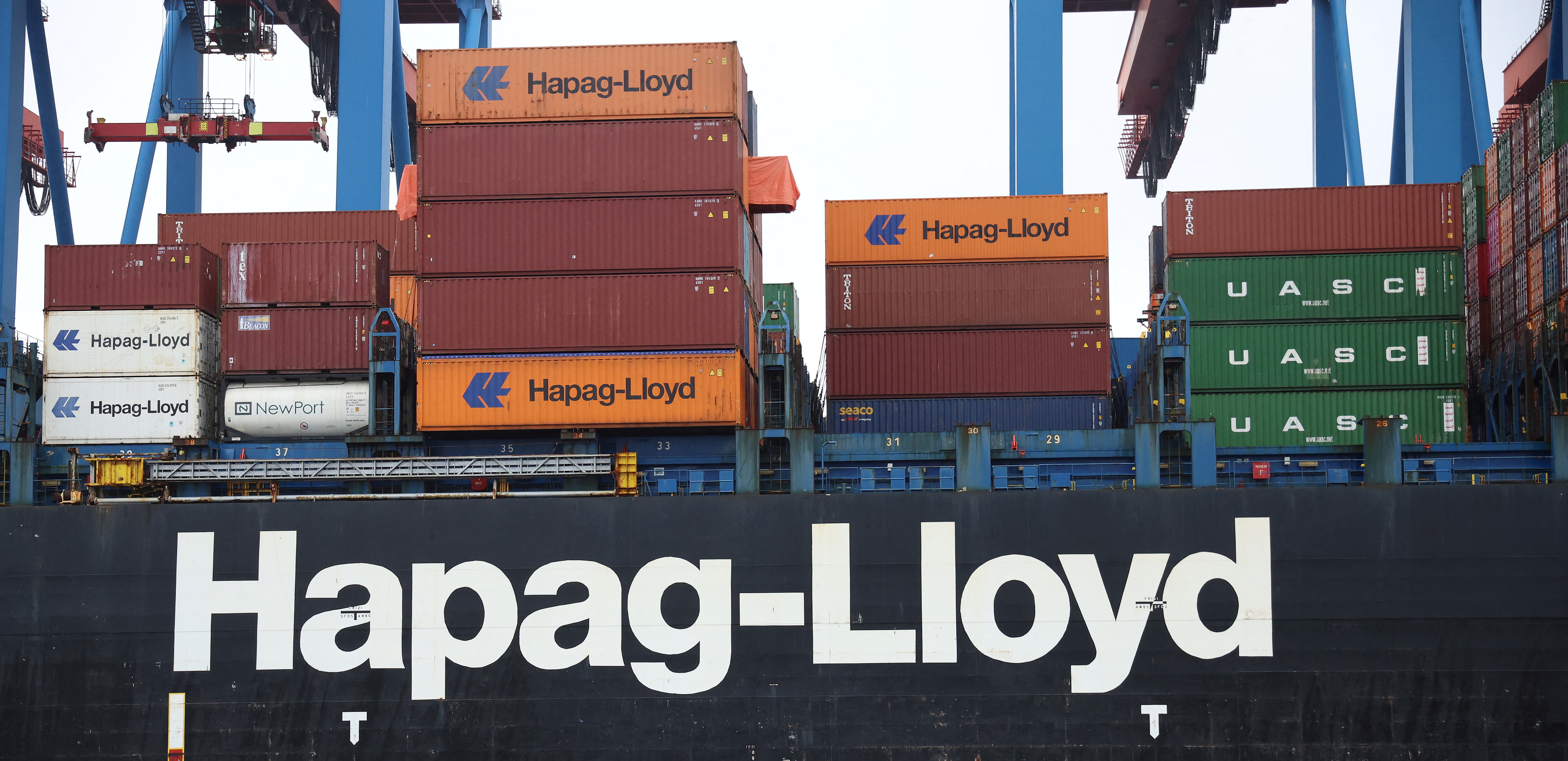 Containers are unloaded from the Hapag-Lloyd container ship Chacabuco at the HHLA Container Terminal Altenwerder on the River Elbe in Hamburg, Germany