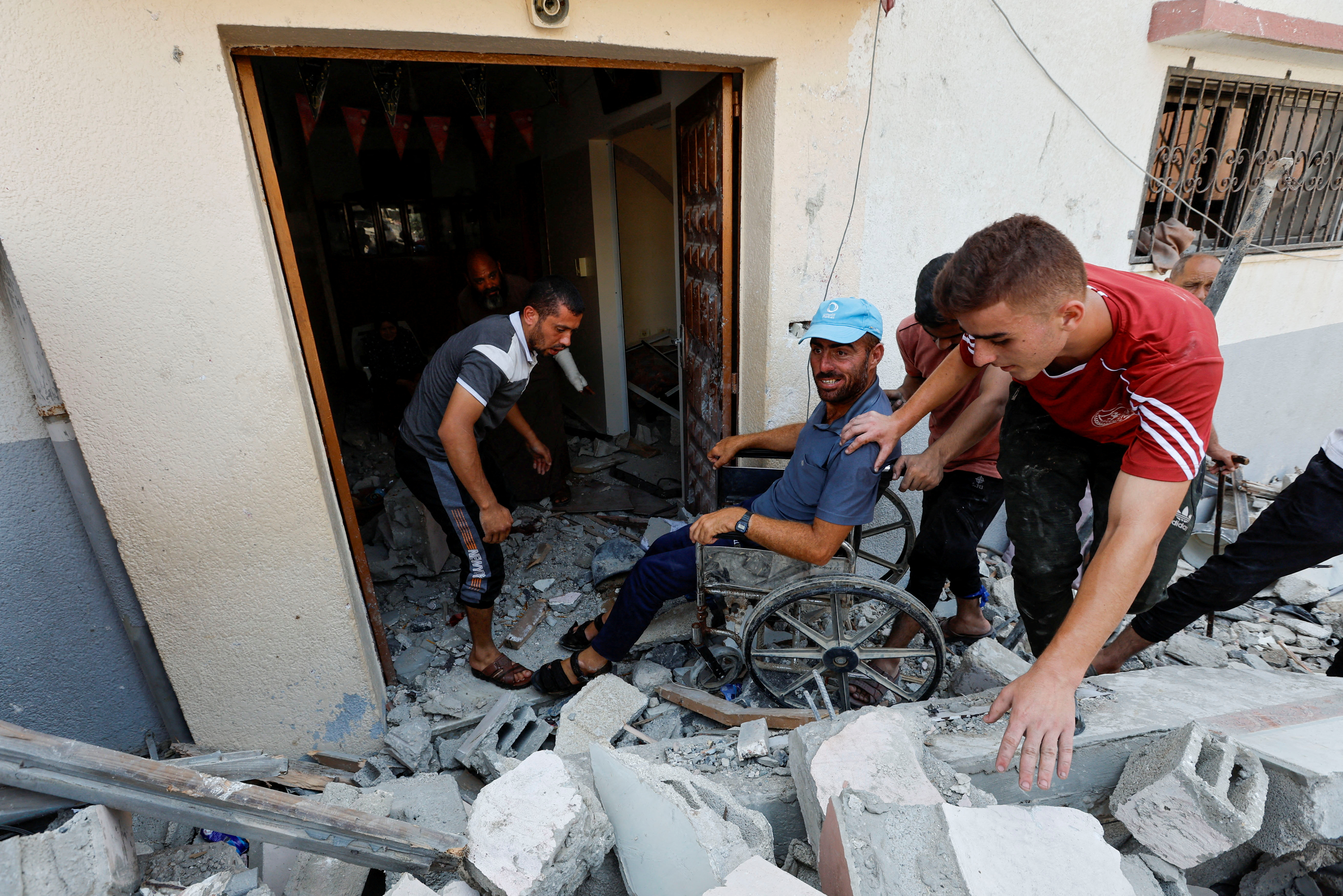 Disabled Palestinians of Shamalakh family lose their house in an Israeli air strike