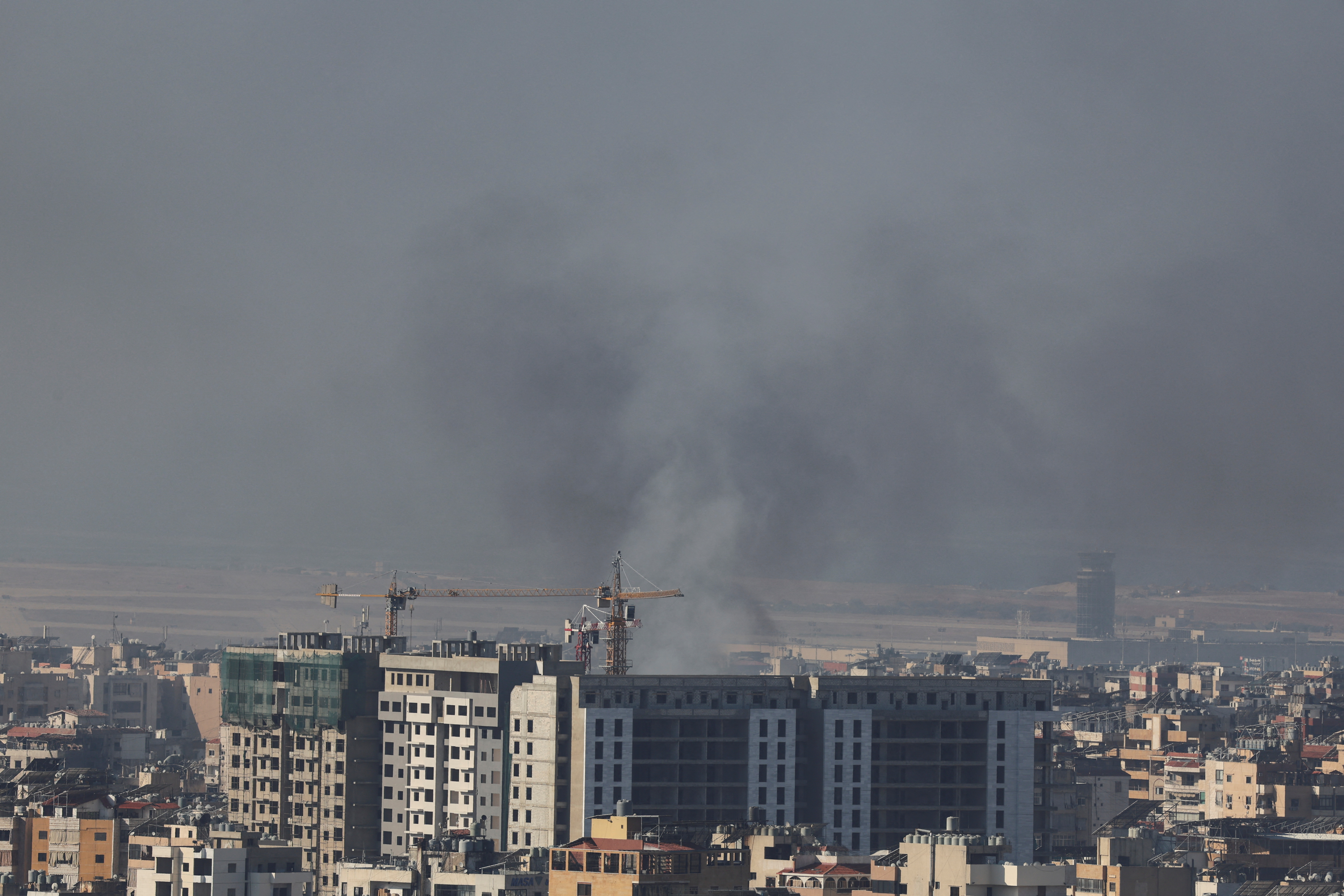 Smoke rises over Dahiyeh in Beirut's southern suburbs, after Israeli air strikes