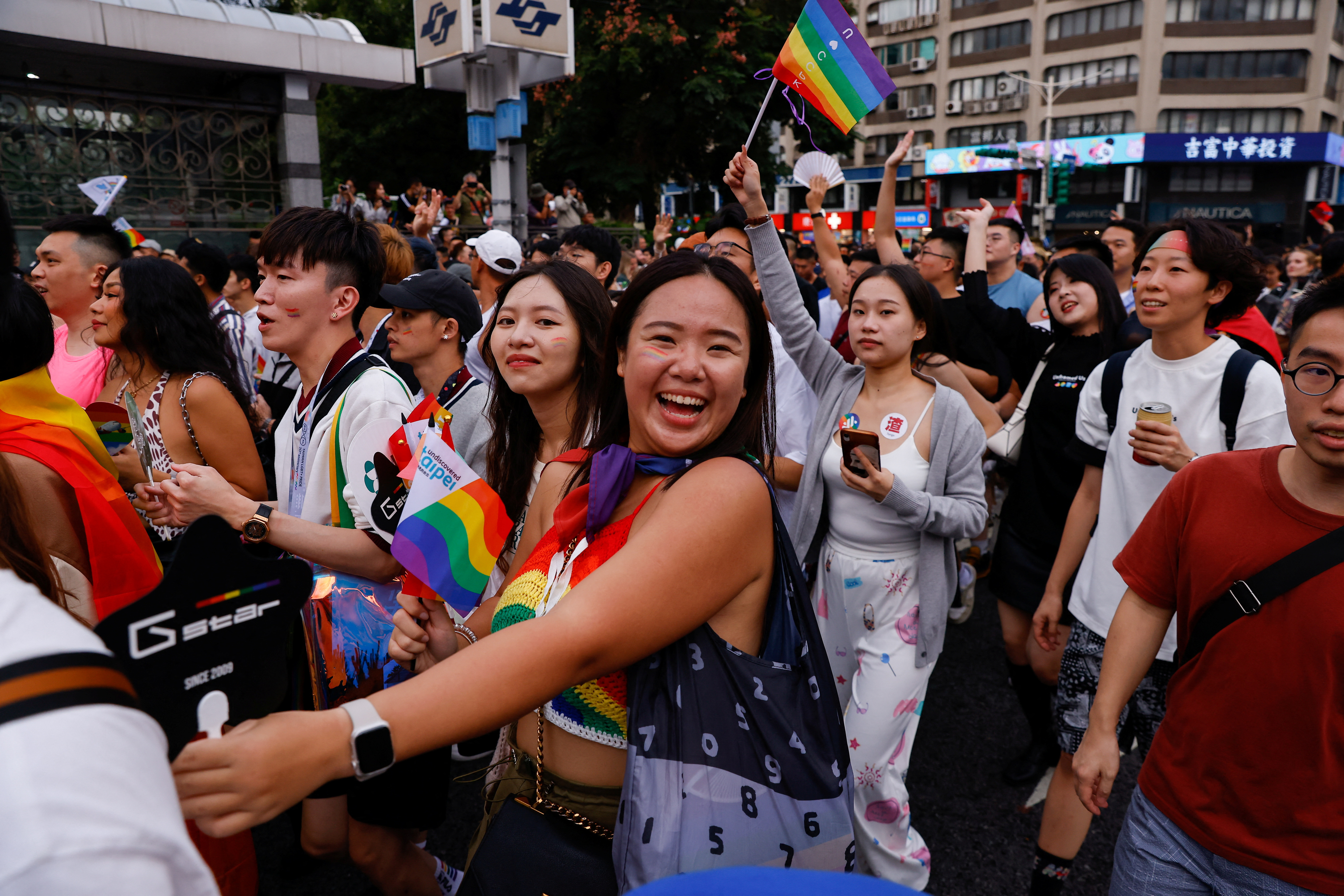 People dance during the march at the annual Taiwan's Pride parade in Taipei,