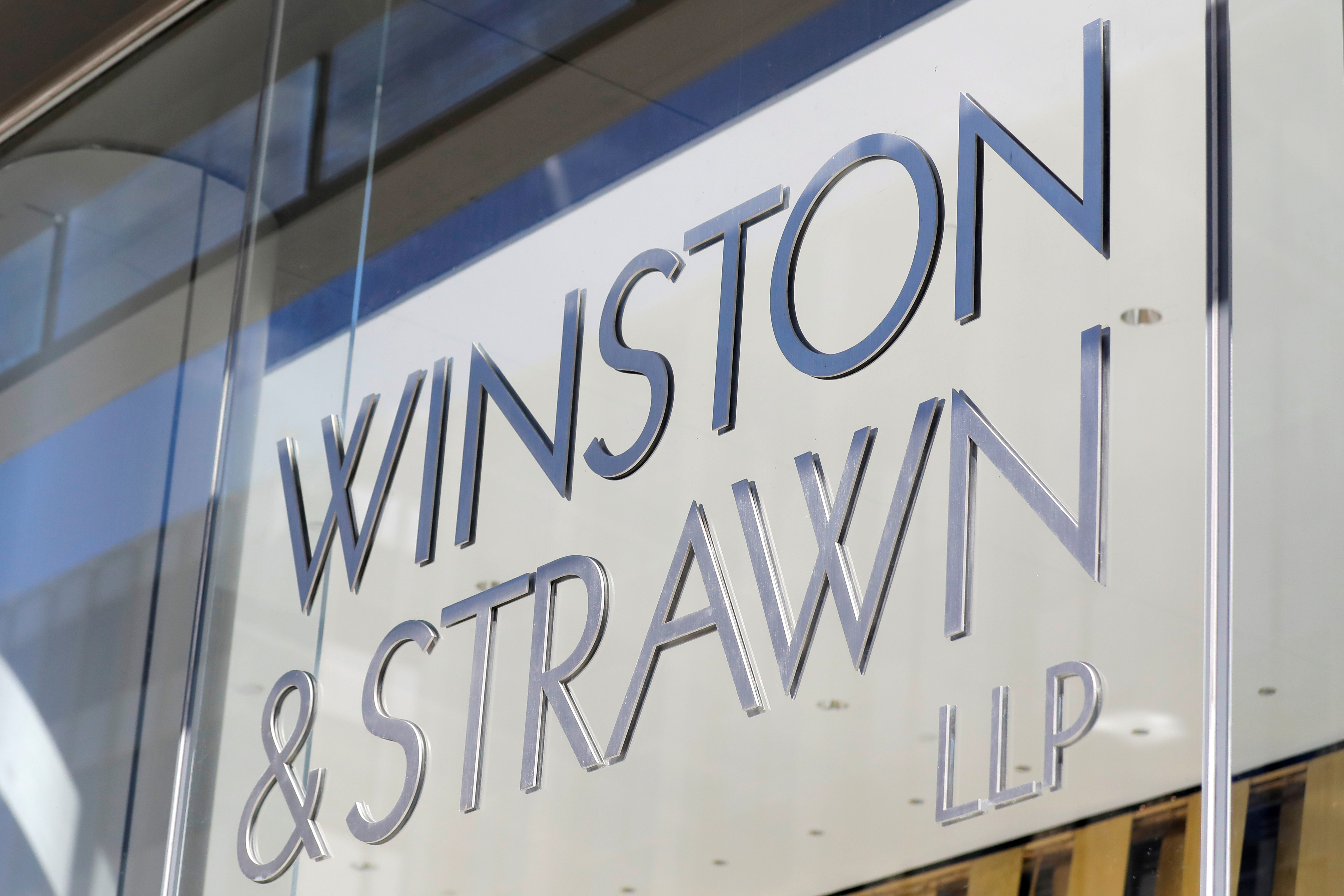 Signage is seen outside of the law firm Winston & Strawn LLP in Washington, D.C.