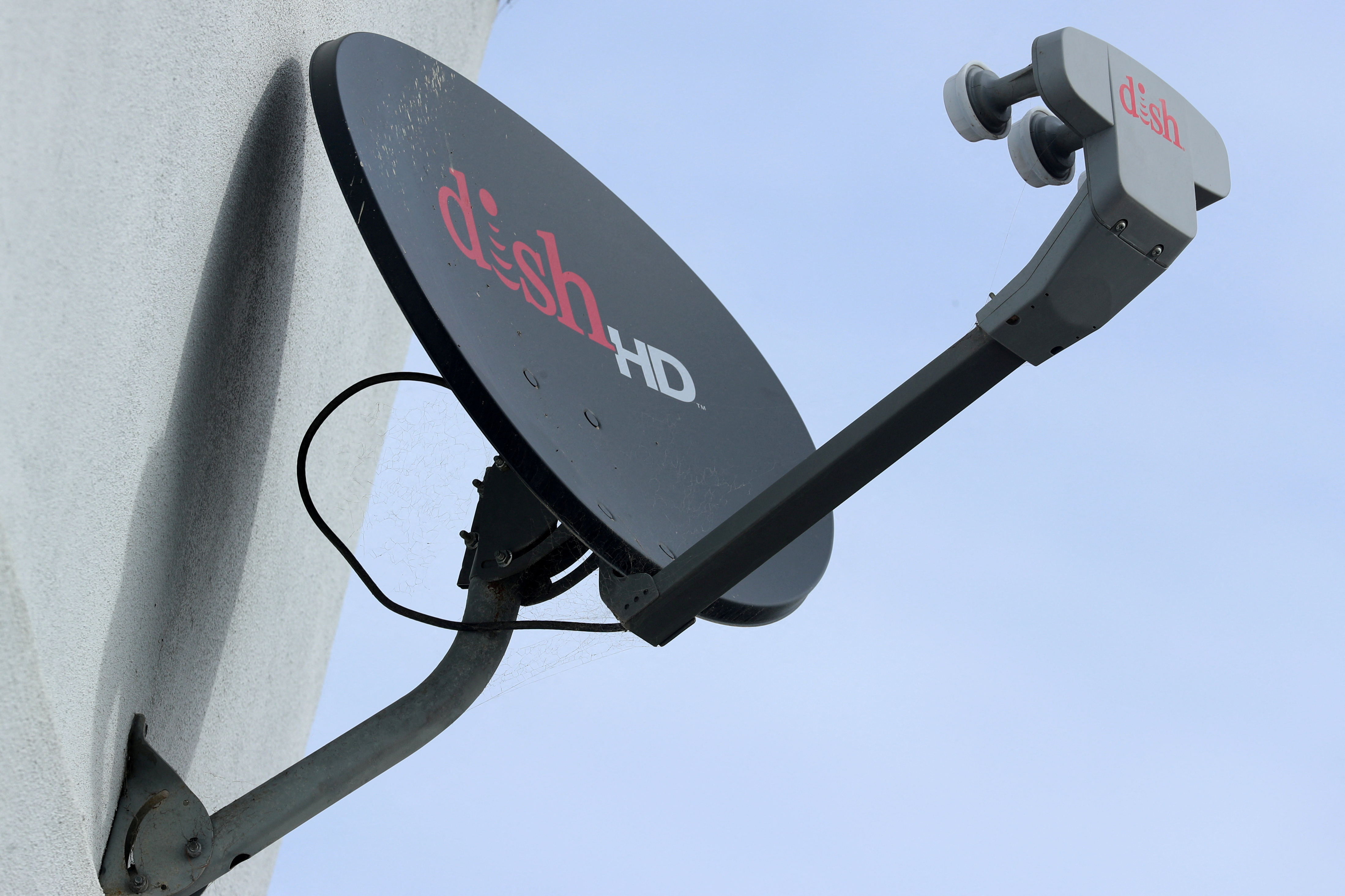 A Dish Network satellite dish is shown on a residential home in Encinitas, California