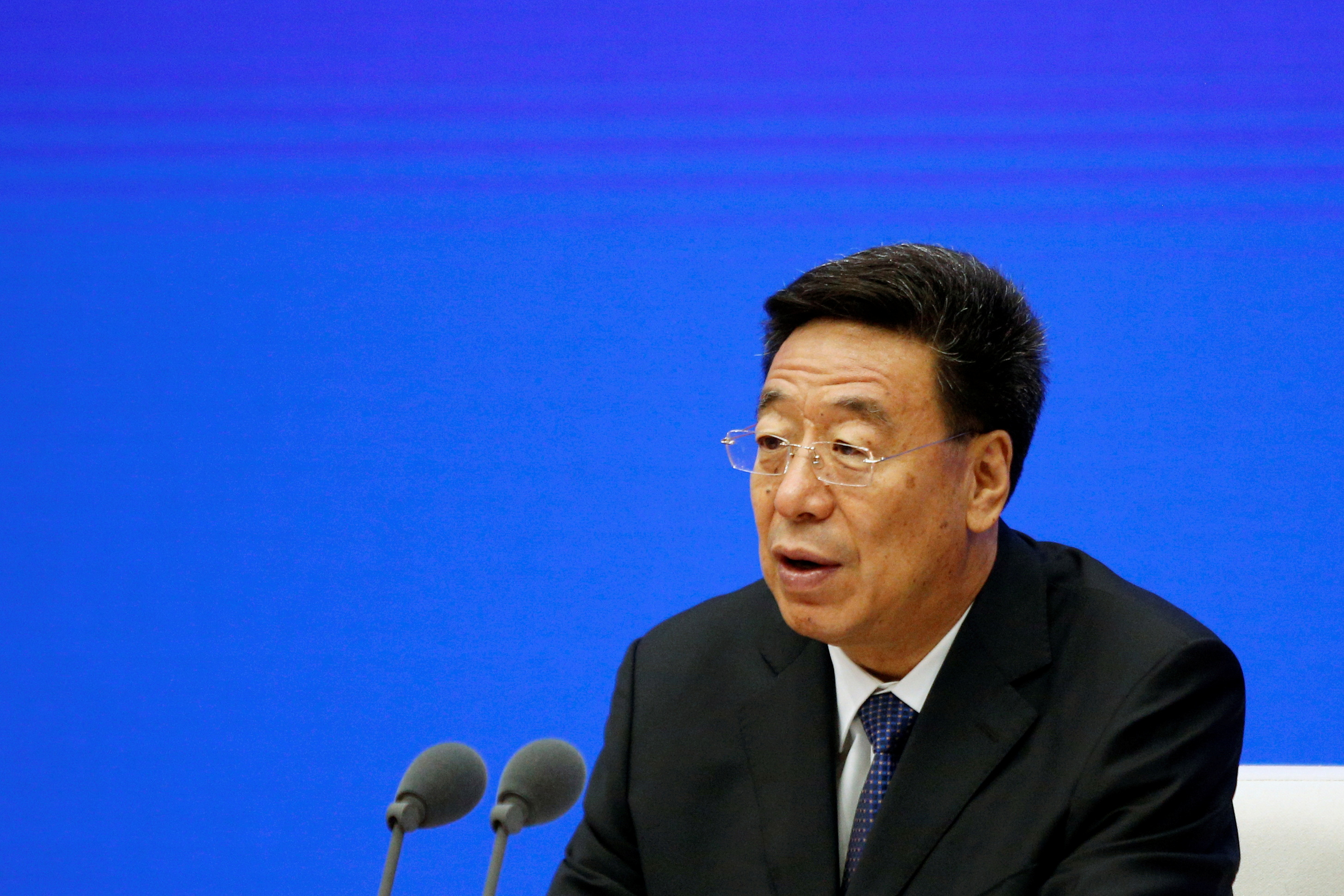 Wu Yingjie, party secretary of Tibet Autonomous Region, attends a news conference in Beijing
