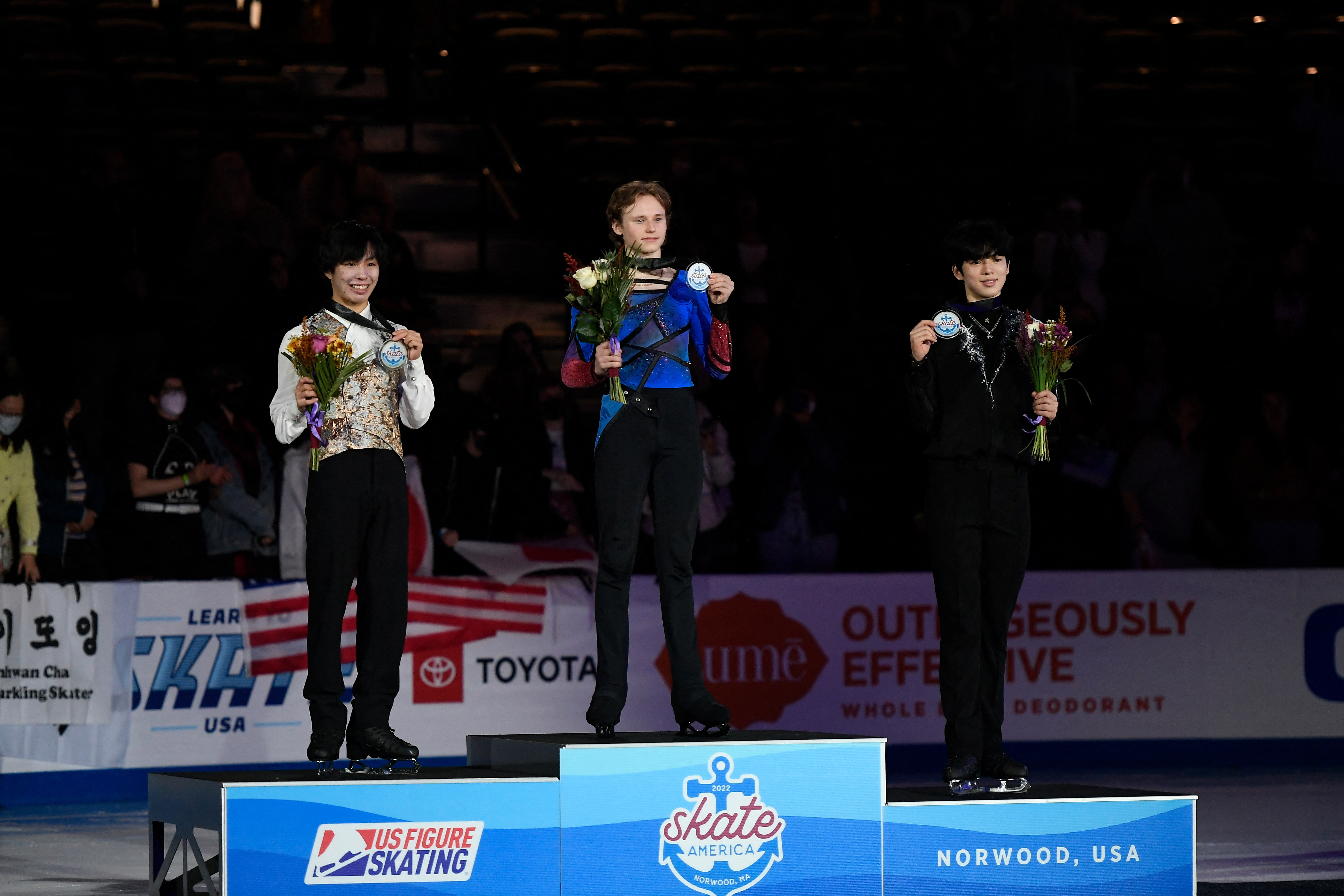 The three medalists for the men's competition - from left to right: Kao Miura (silver), Ilia Malinin (gold), Junhwan Cha (bronze) | Photo Credit: Eric Canha/USA TODAY Sports
