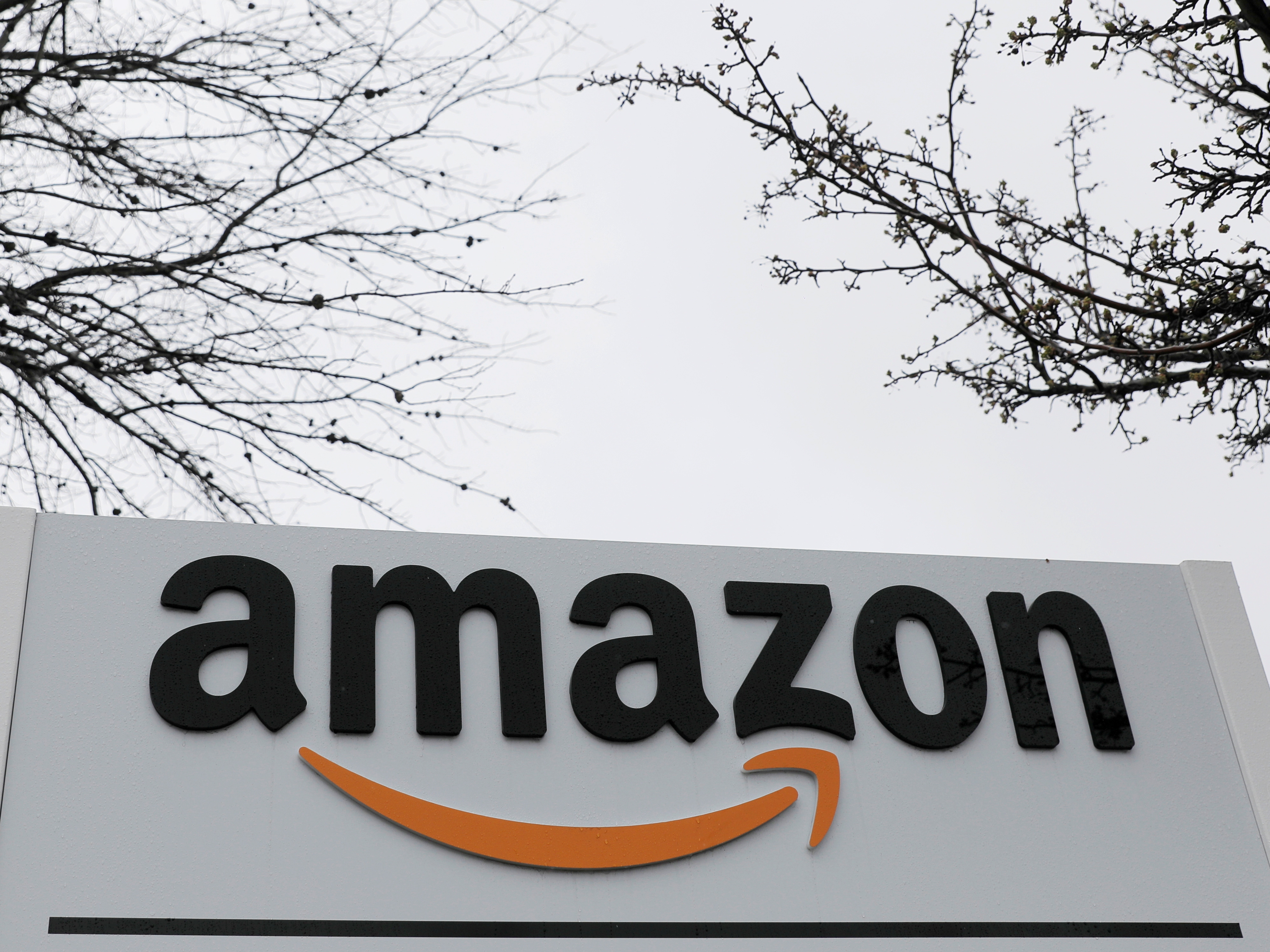Signage is seen at an Amazon facility in Bethpage on Long Island in New York, U.S., March 17, 2020. REUTERS/Andrew Kelly/File Photo