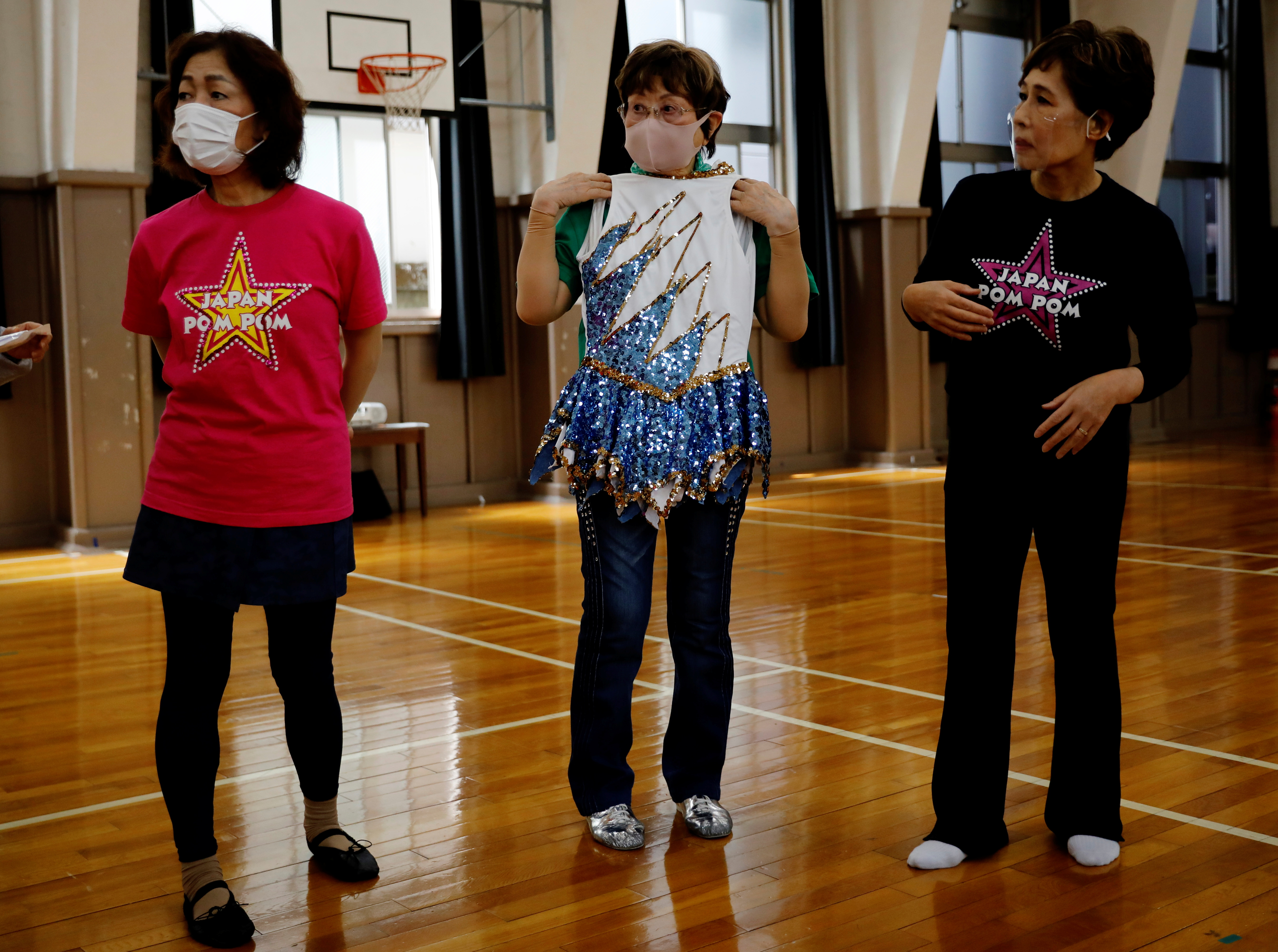 WIDER IMAGE 'Try anything': Japan's silver-haired cheer-dancing squad