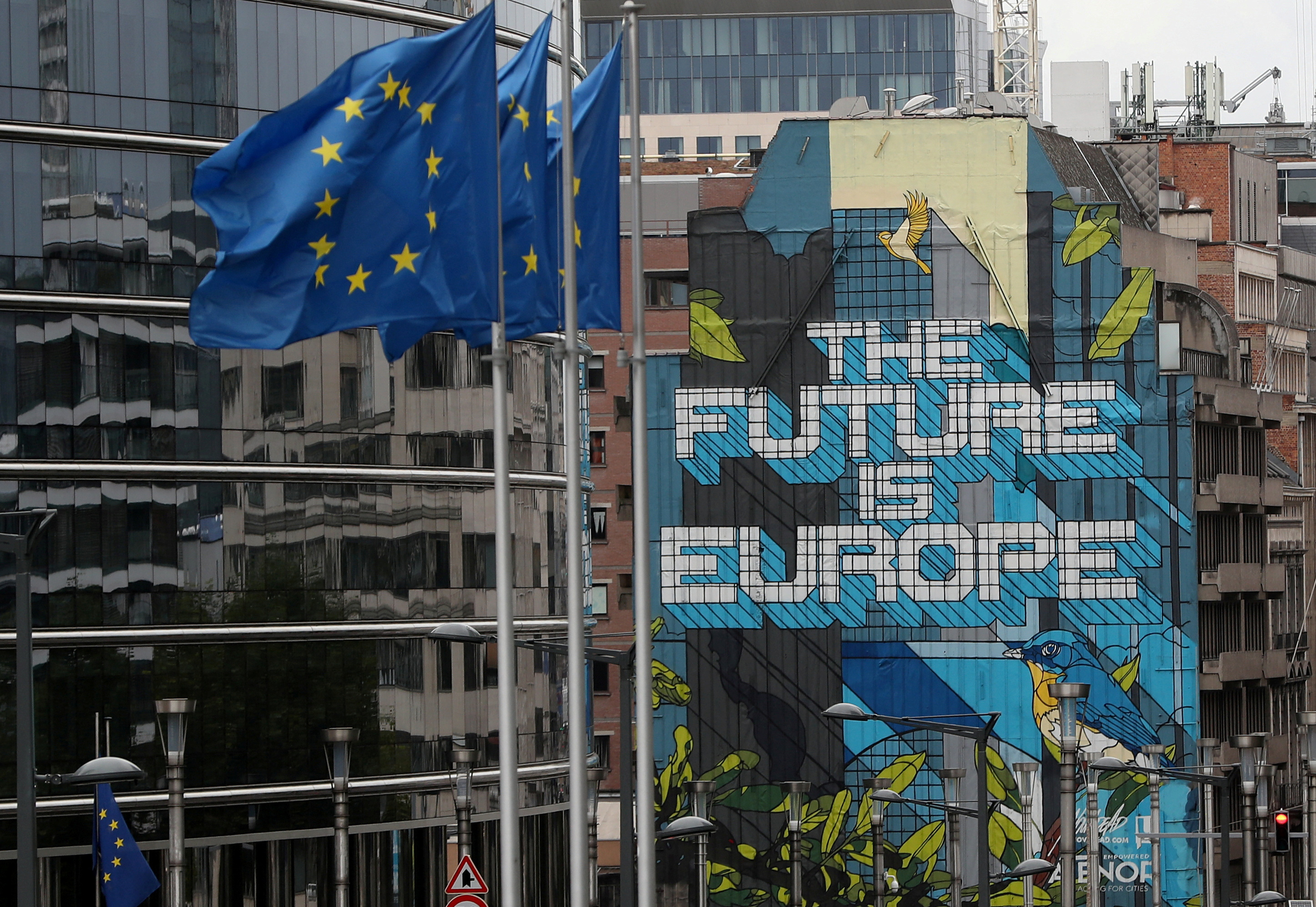 European Union flags fly near the European Commission headquarters in Brussels