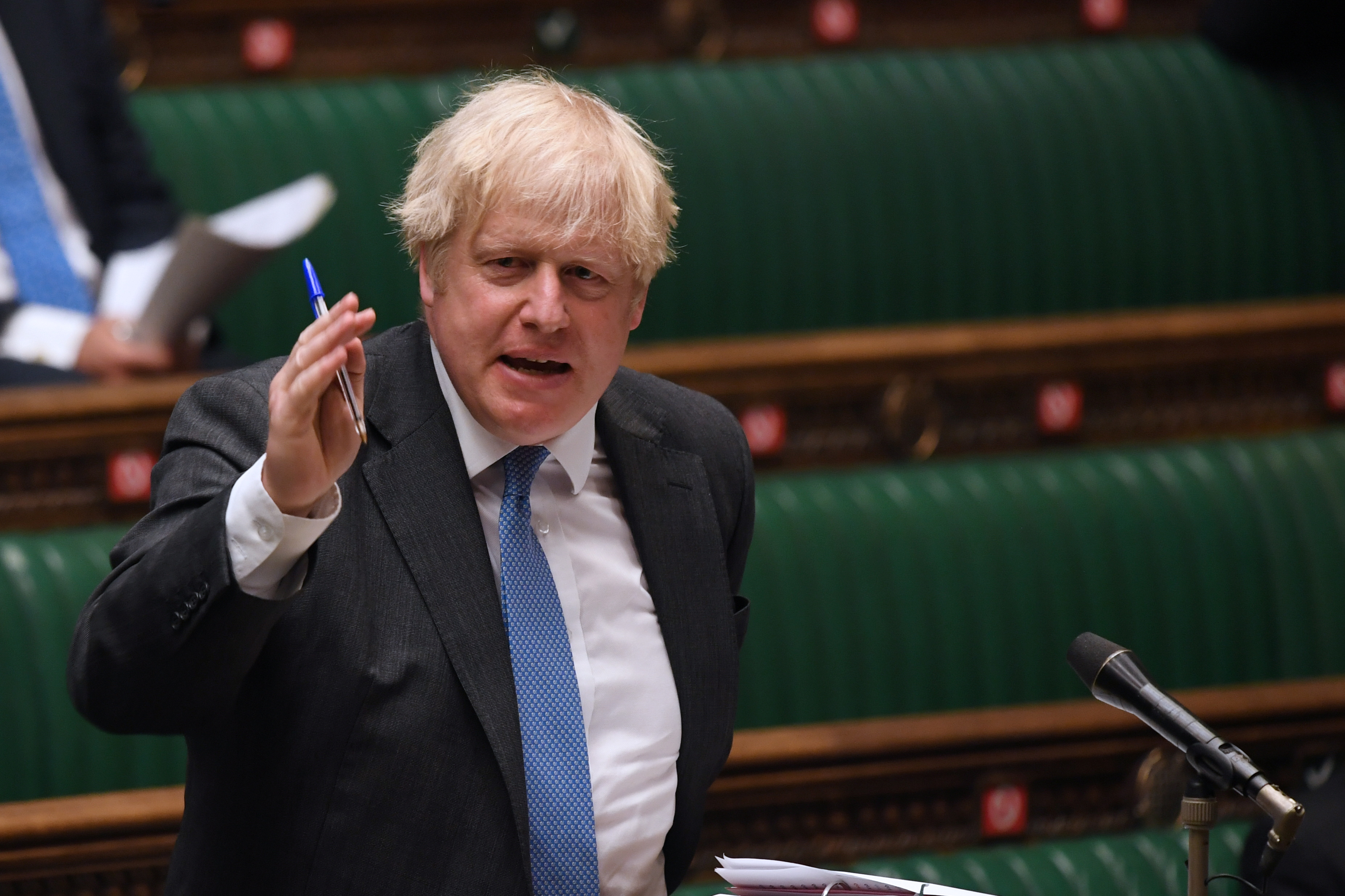 British Prime Minister Boris Johnson takes questions in Parliament, in London