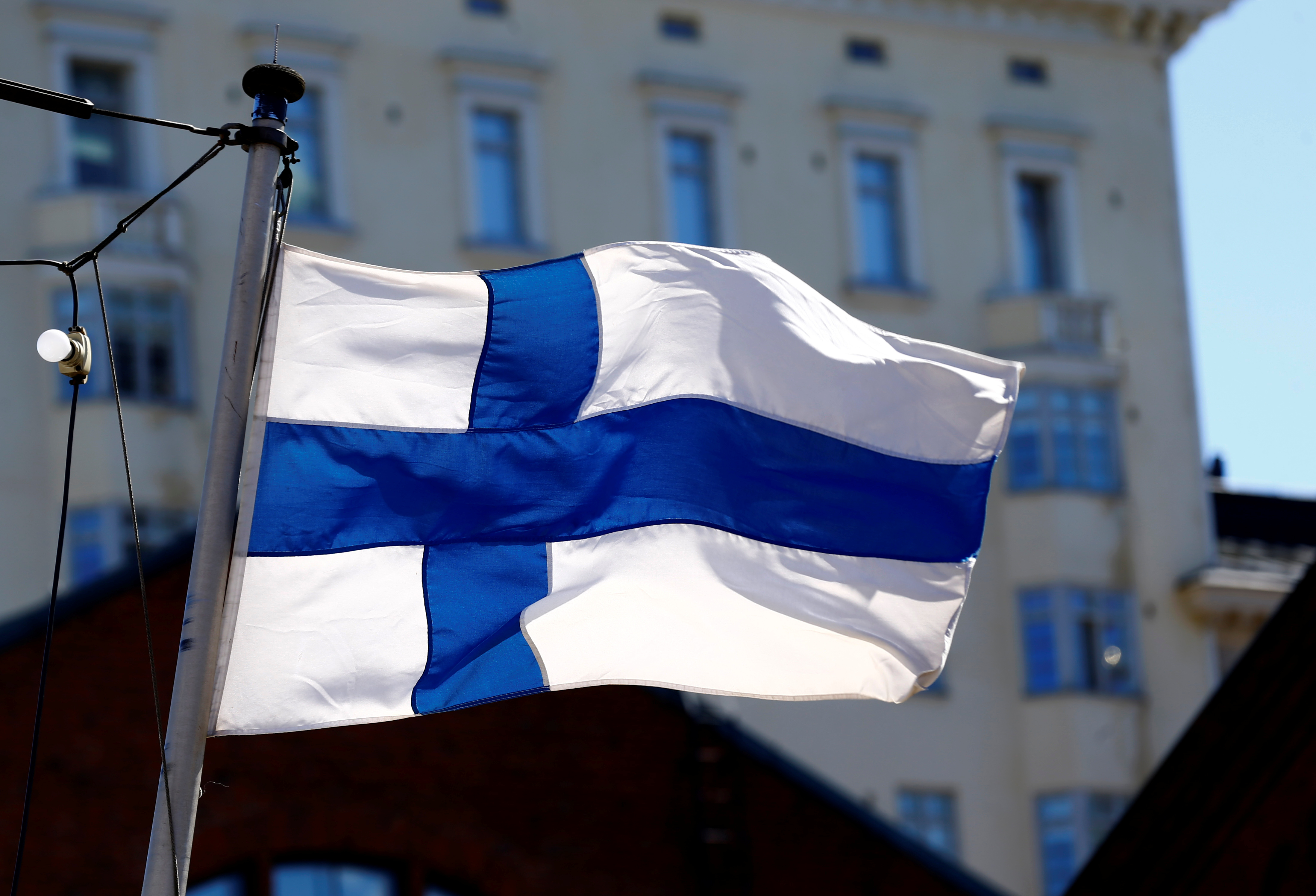 Finland's flag flutters in Helsinki