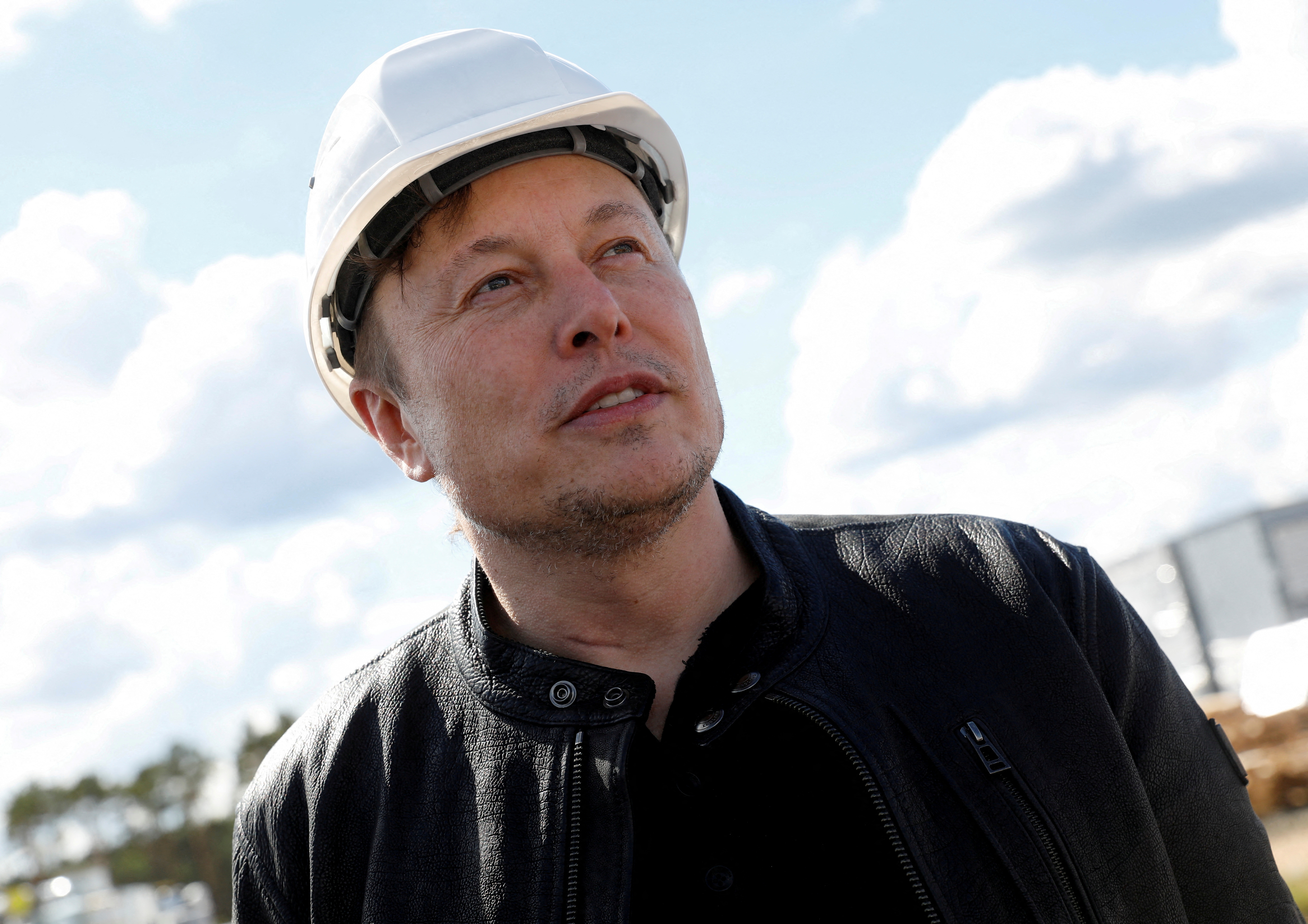 SpaceX founder and Tesla CEO Elon Musk looks on as he visits the construction site of Tesla's gigafactory in Gruenheide, near Berlin, Germany, May 17, 2021. REUTERS/Michele Tantussi